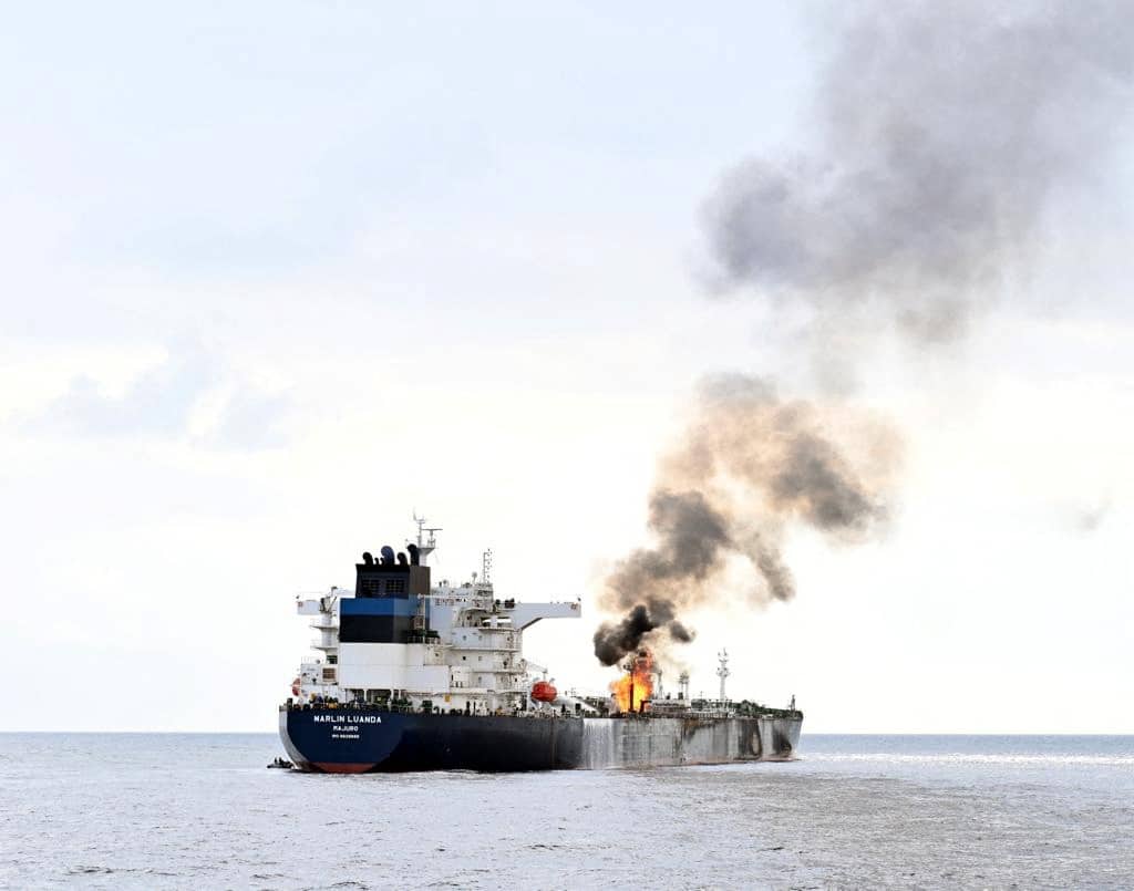 image Crew extinguishes blaze on tanker hit by missile in Gulf of Aden