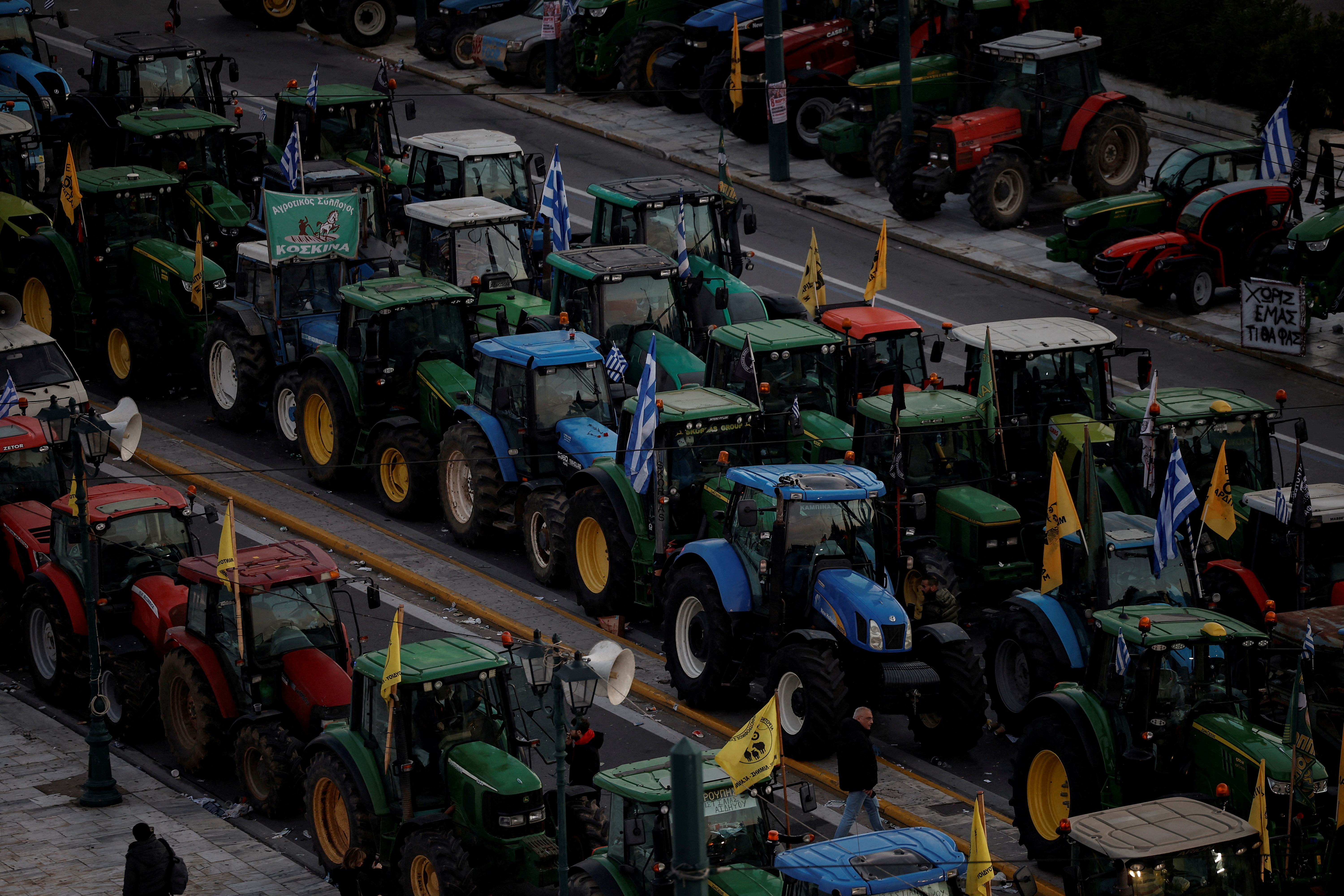 cover Greek farmers join tractor protest in front of parliament for second day
