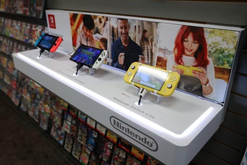 Different models of the Nintendo Switch are seen on display in a GameStop in Manhattan, New York, U.S., December 7, 2021. REUTERS/Andrew Kelly/File Photo