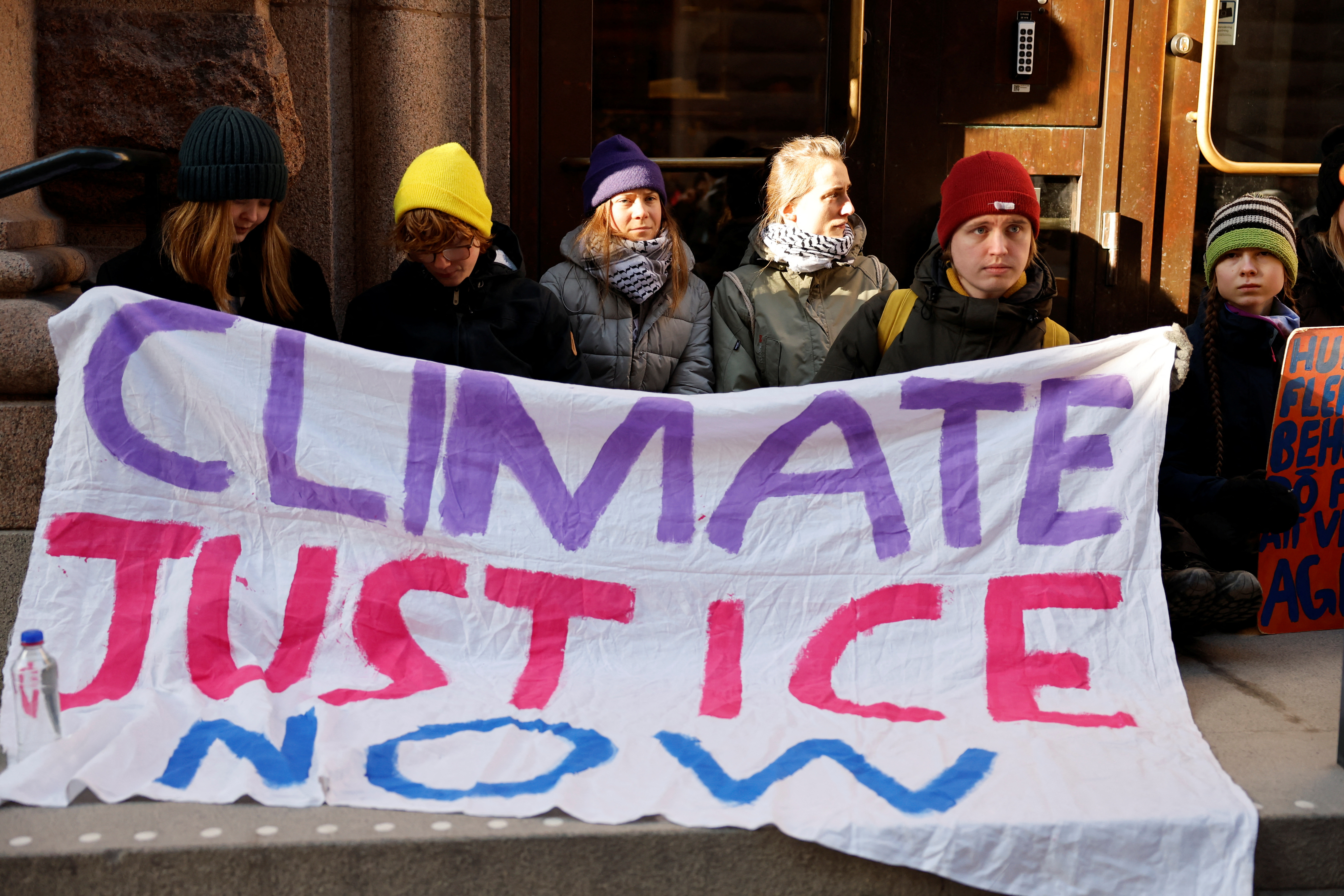 image Greta Thunberg, other climate activists block Swedish parliament entrances