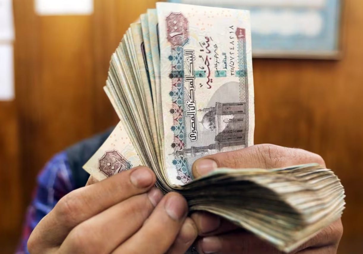 image Egypt secures IMF deal after pound plunge, bumper rate hike