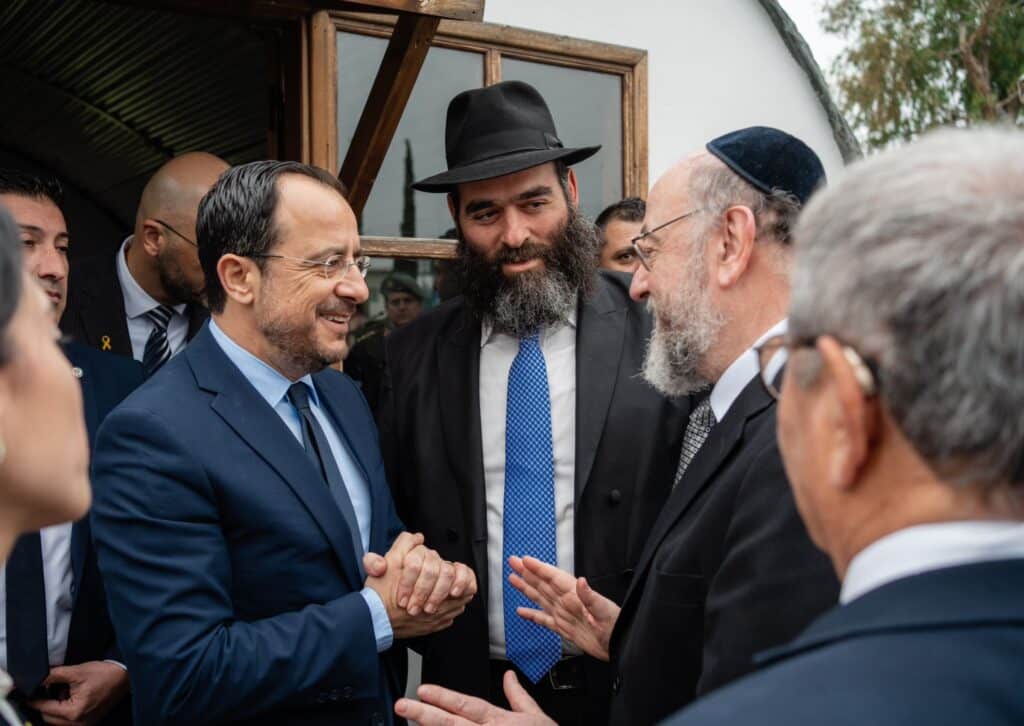 profile the president of cyprus with both chief rabbis
