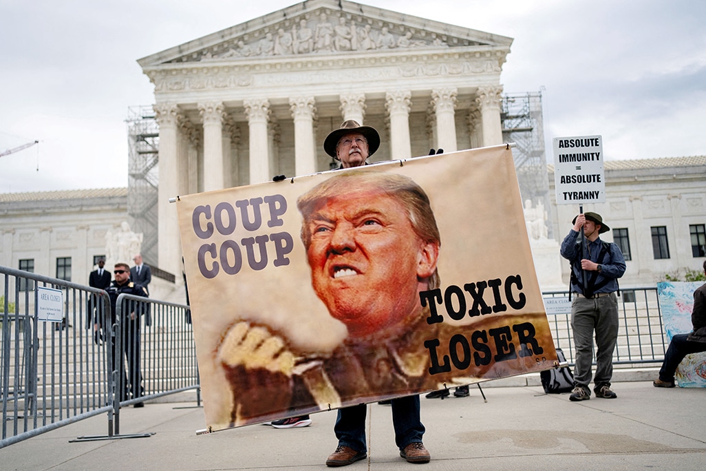 cover At US Supreme Court, clashing views presented on presidential immunity