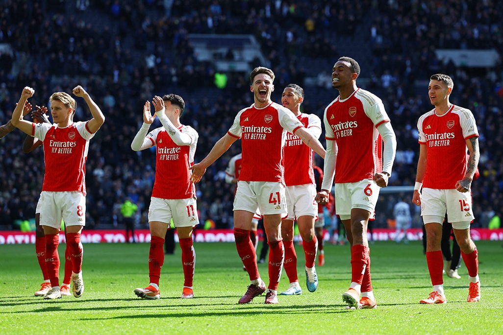 image Arsenal hang on to beat Spurs in derby