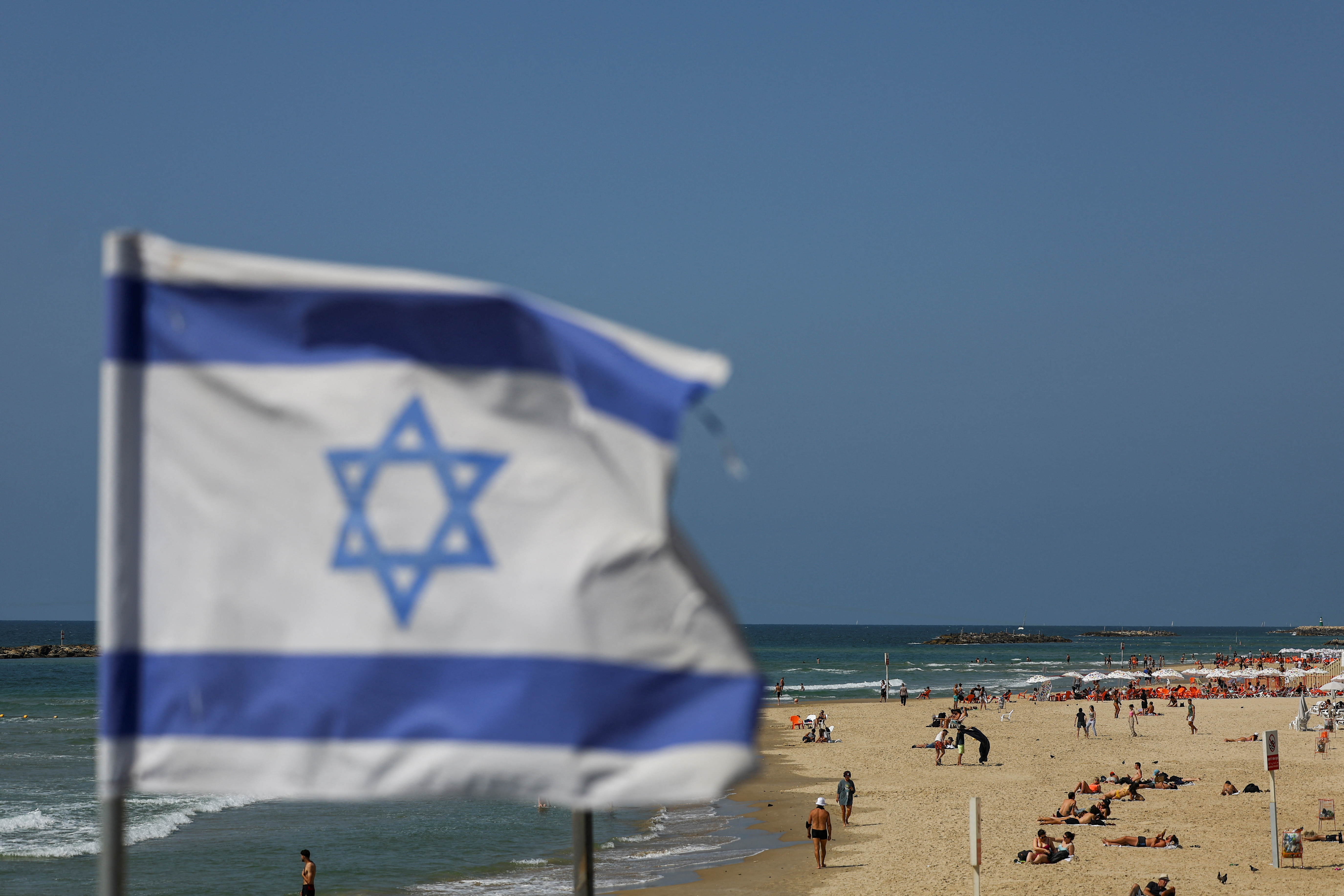 cover Israelis rattled by Iranian attack, fear escalation