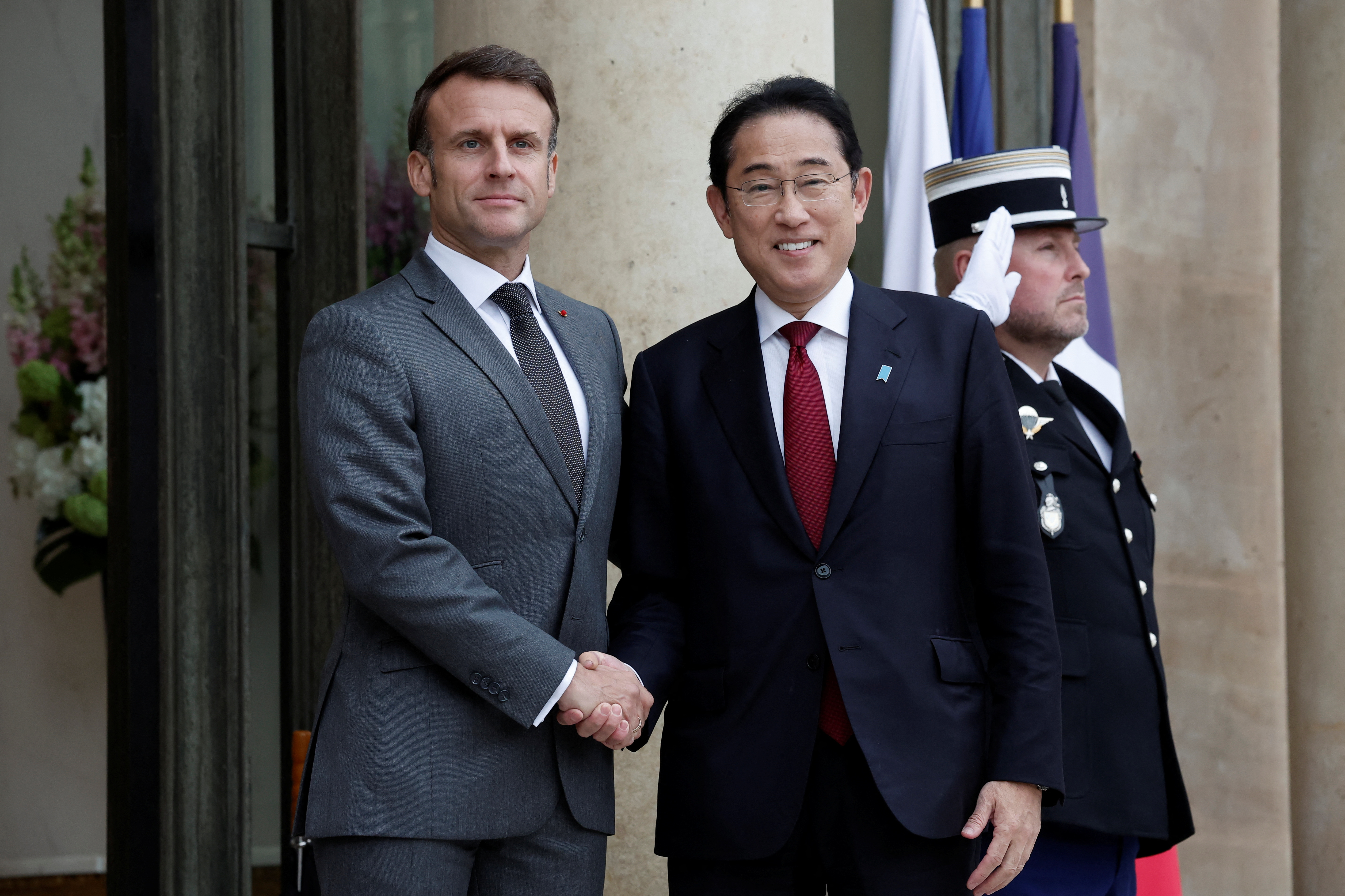 cover France, Japan to start talks on reciprocal troops pact