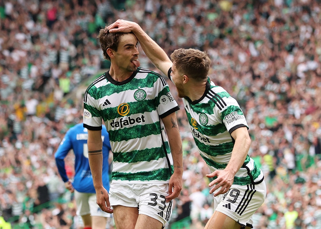 cover Celtic go six points clear with 2-1 win over 10-man Rangers