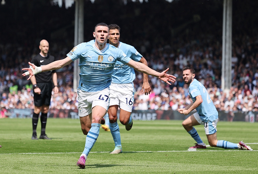 cover Man City go top after thrashing Fulham