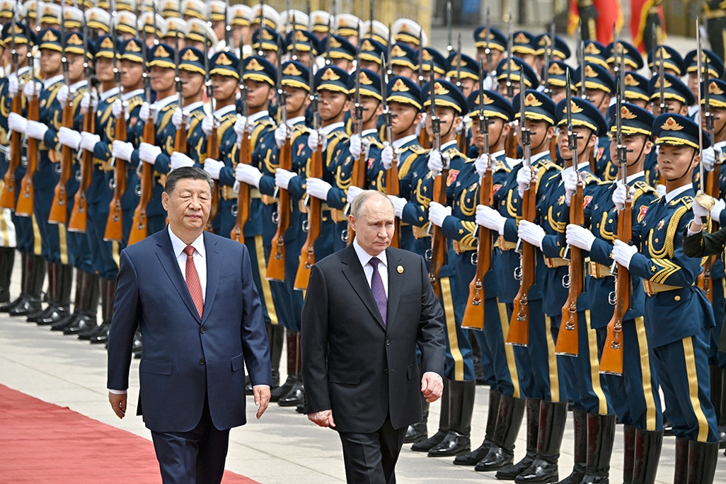 image Xi and Putin condemn US, pledge closer ties