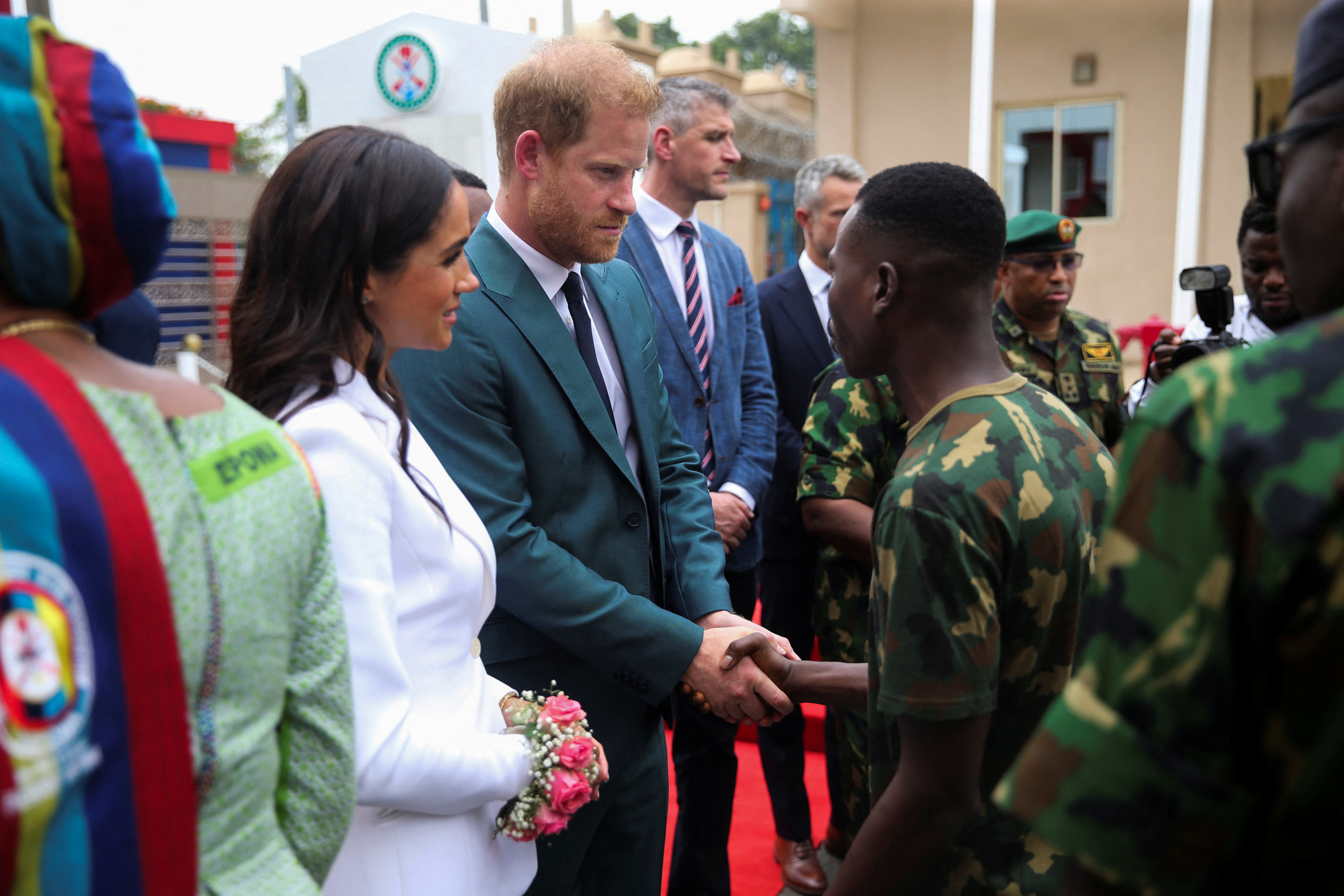 image Prince Harry and Meghan, greeted with cheers, talk mental health in Nigeria