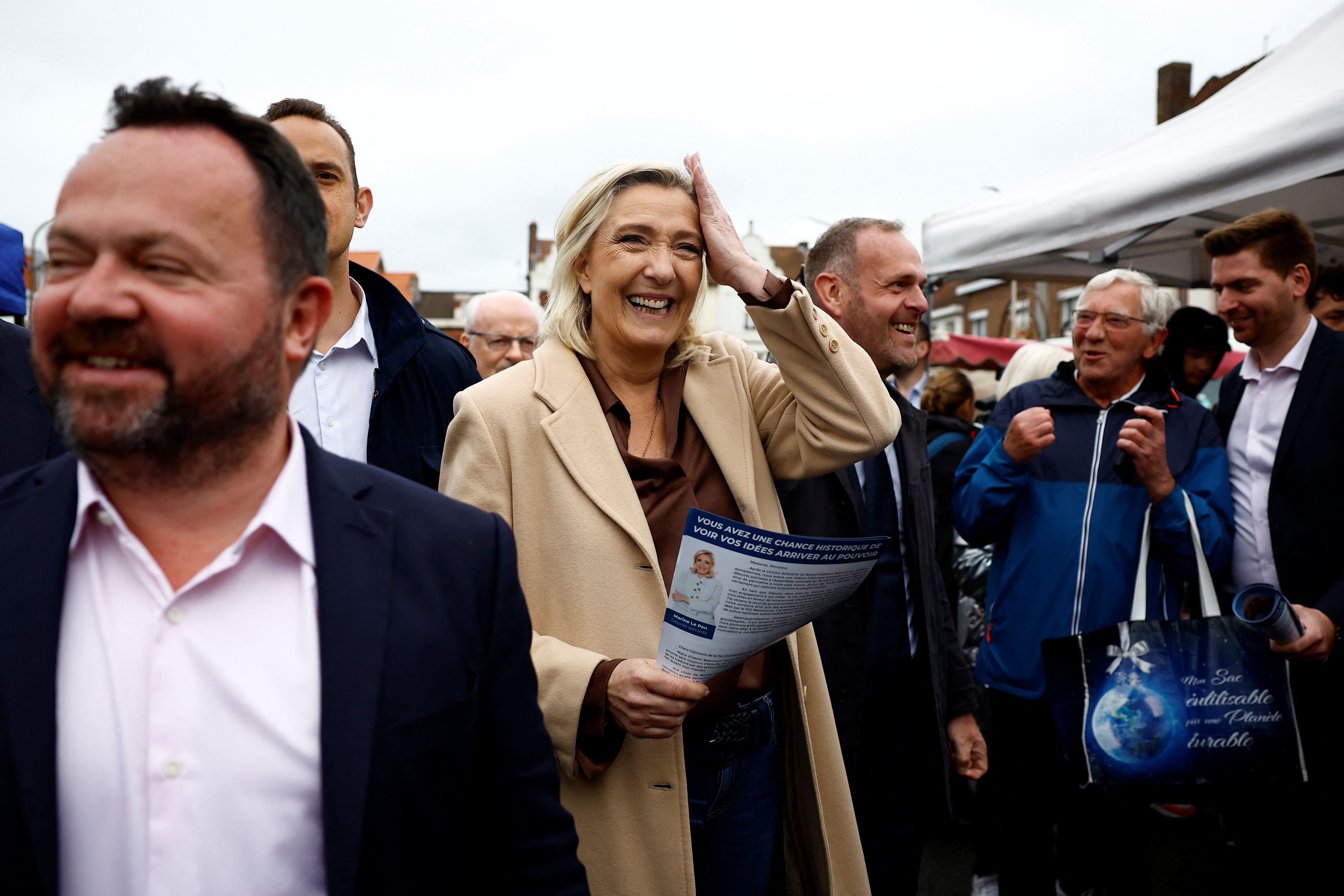 cover France&#8217;s far right National Rally still leading ahead of election, poll shows
