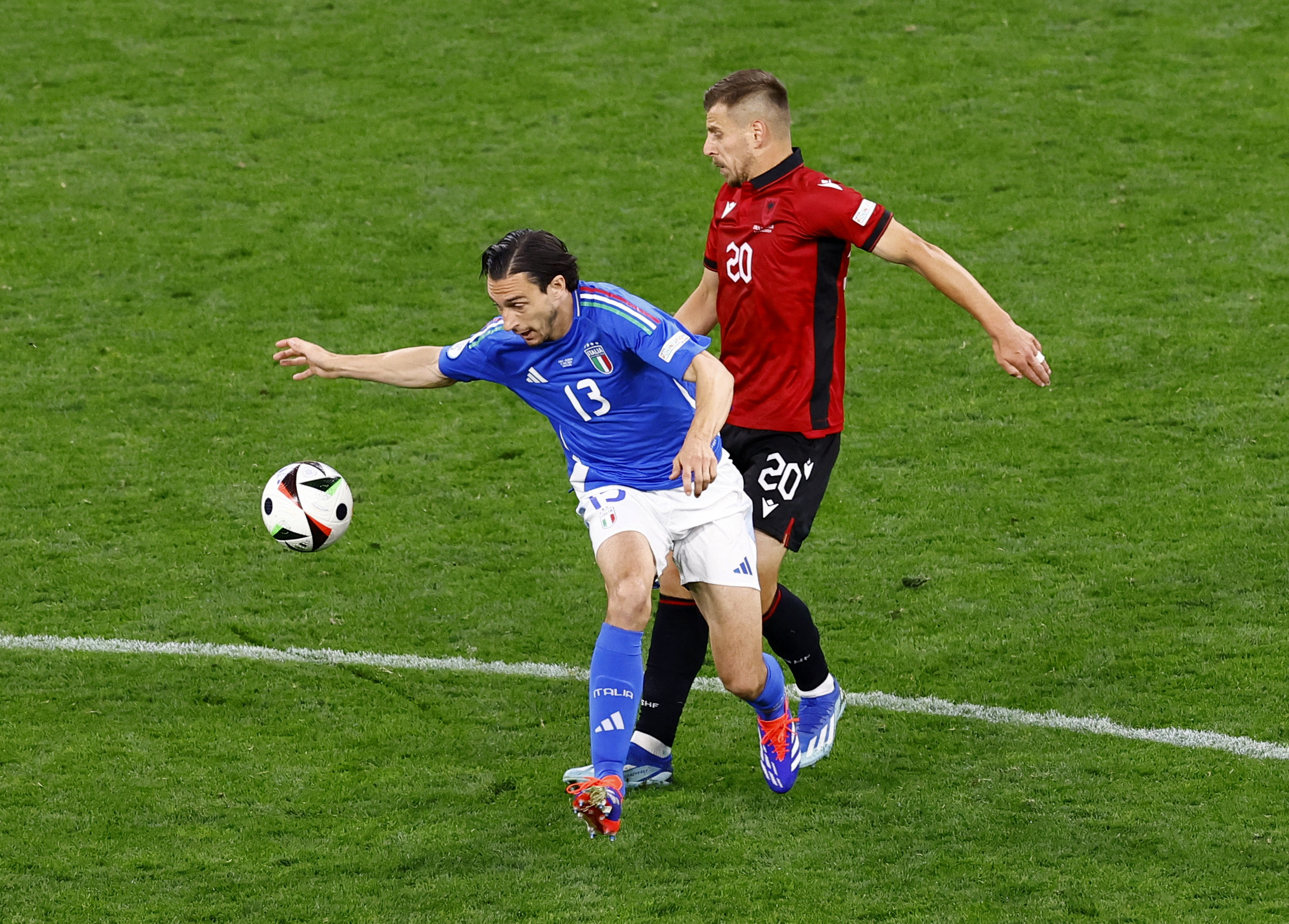 cover Italy see off Albania after record early scare
