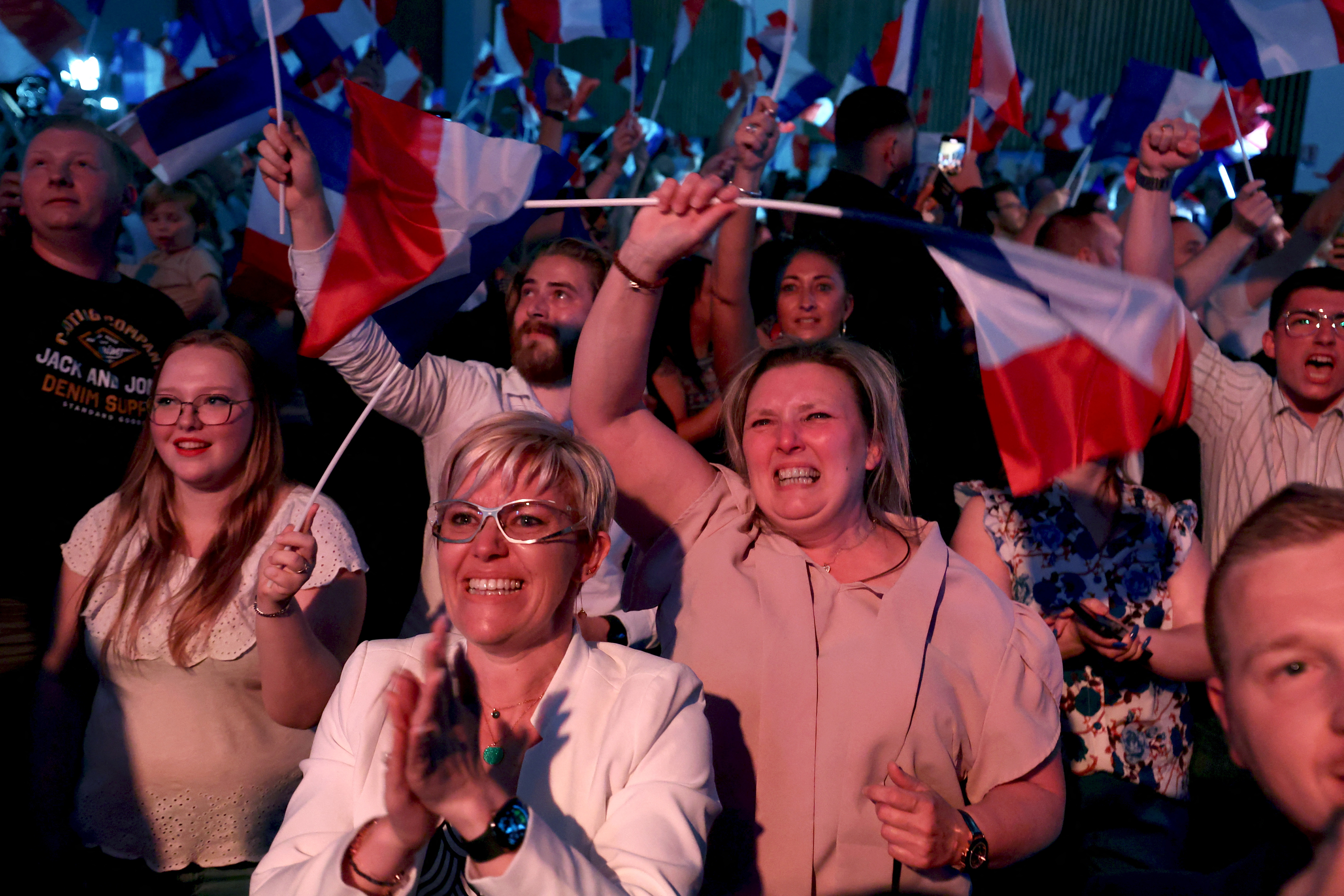Far right wins first round in France election, but final result uncertain, exit polls show