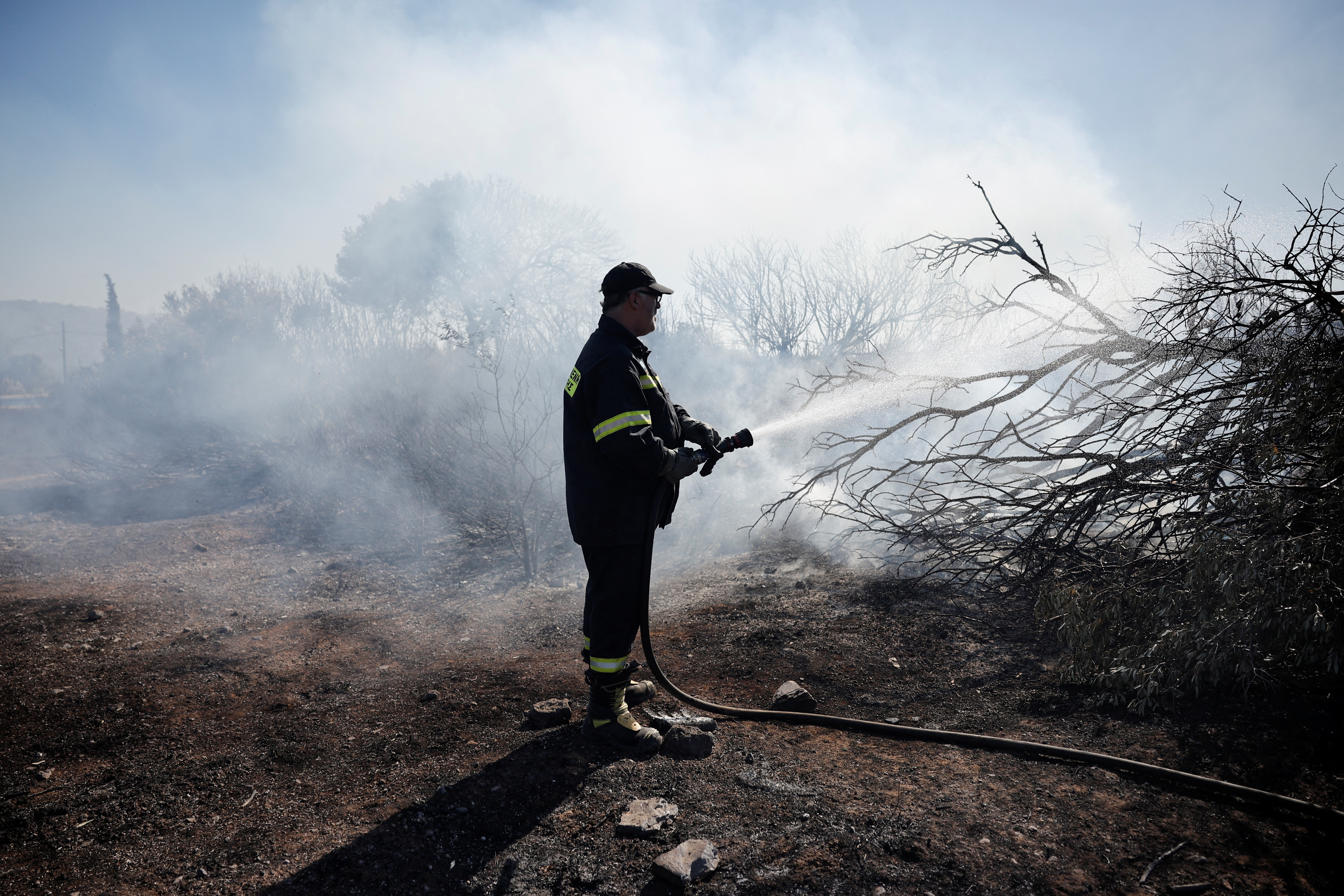 Greek firefighters battle new wildfire near Athens amid strong winds