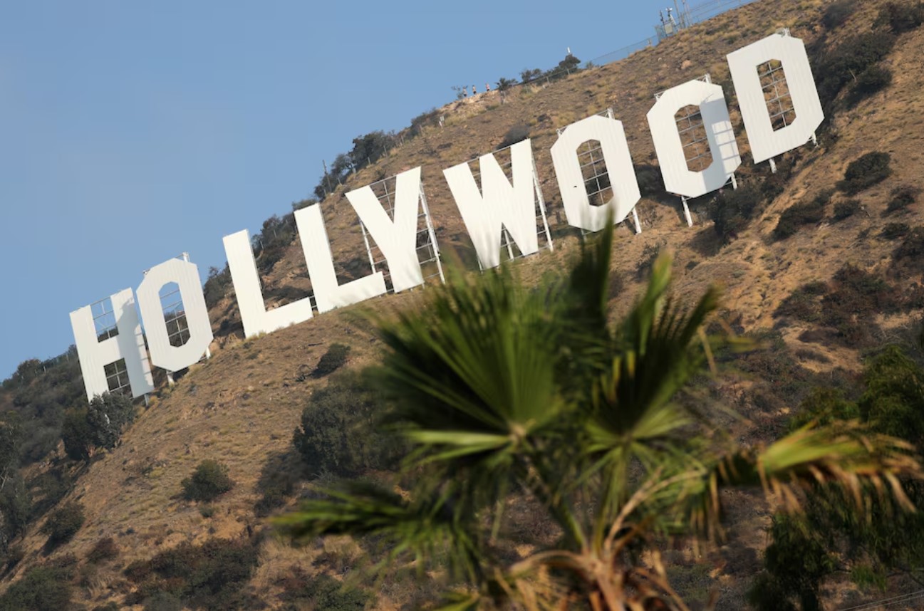 cover Hollywood workers union reaches pay, AI-use deal with top studios