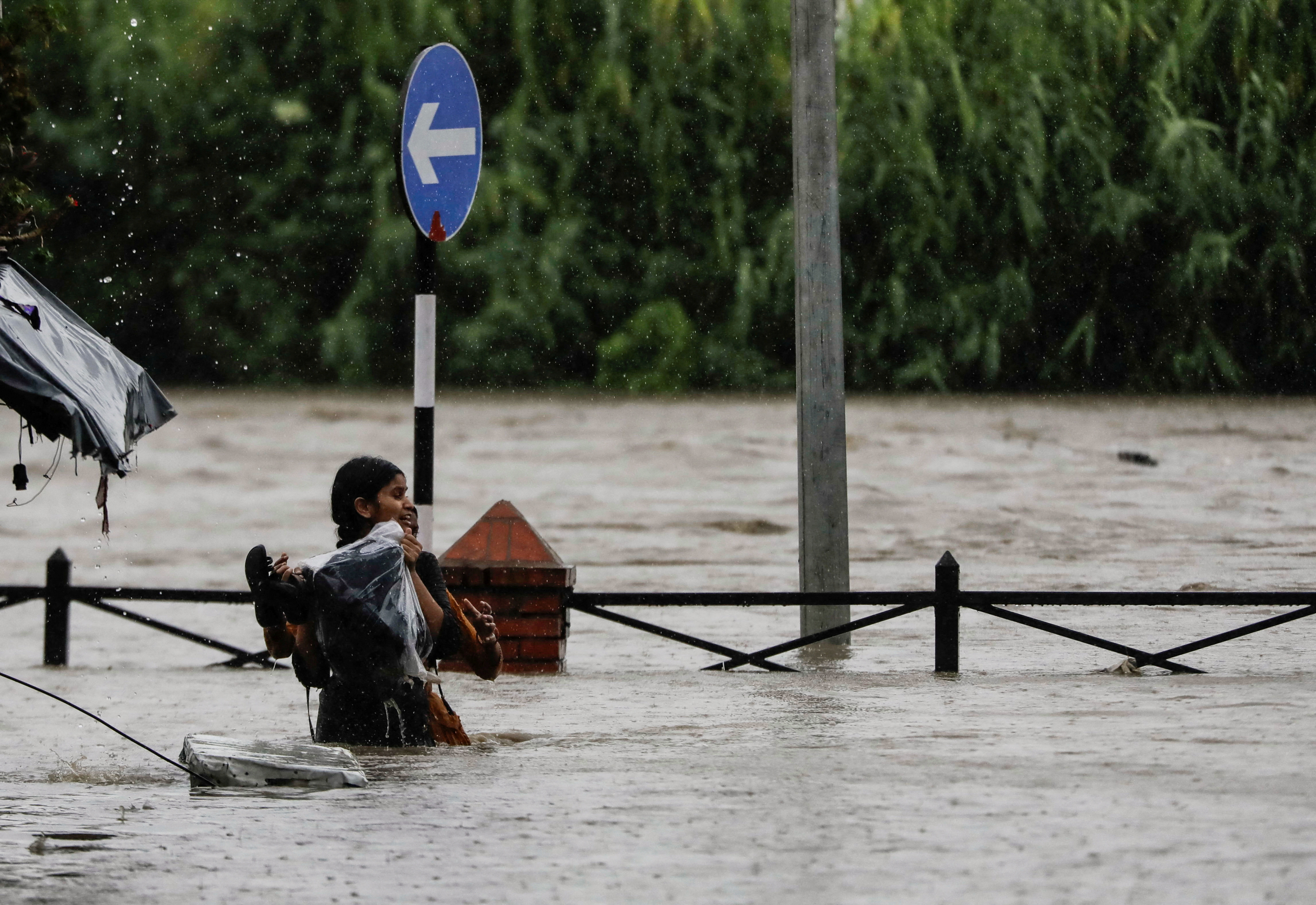 Nepal landslides sweep two buses into a river, 65 passengers missing