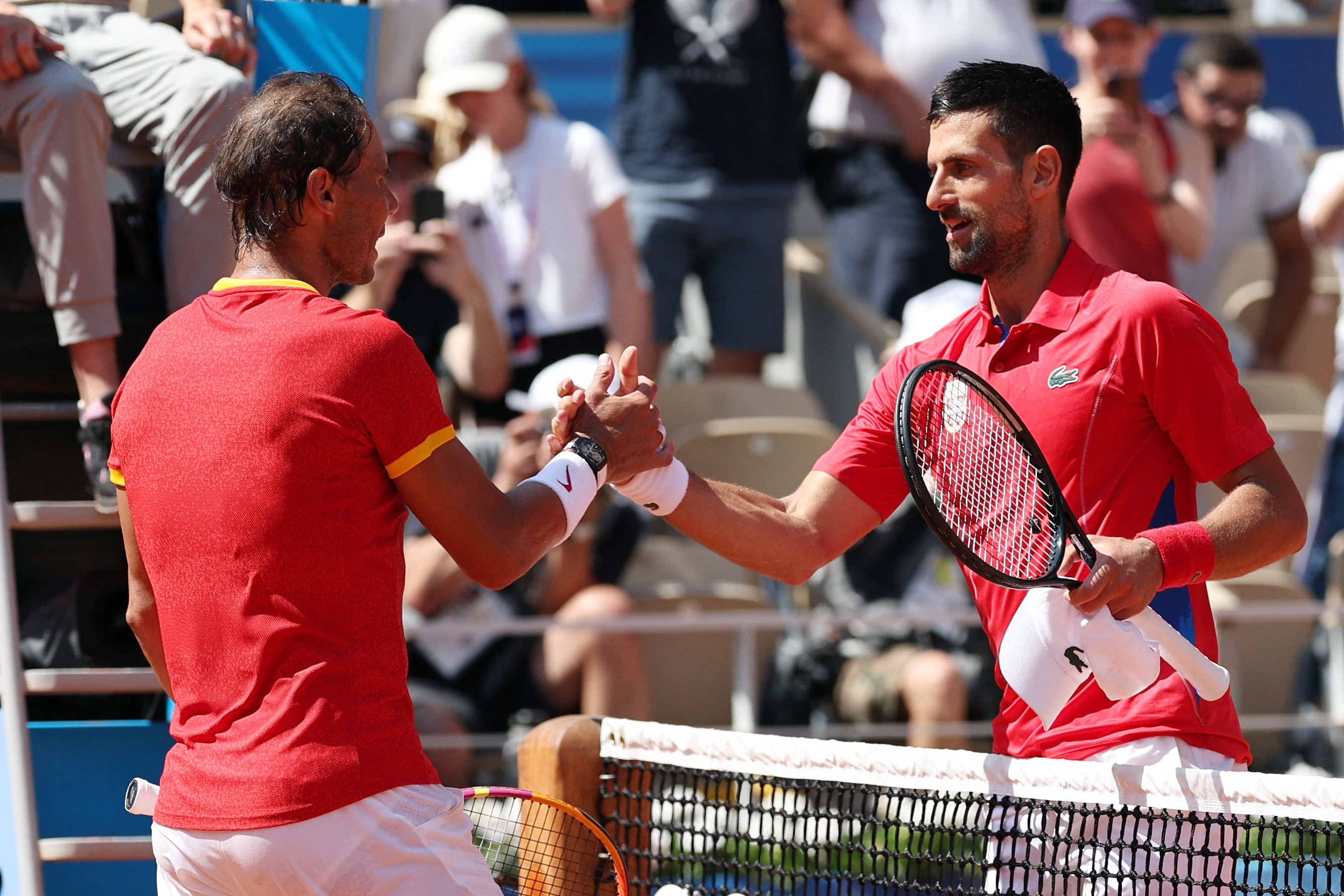 Djokovic survives wobble to ease past error-prone Nadal at Paris Games