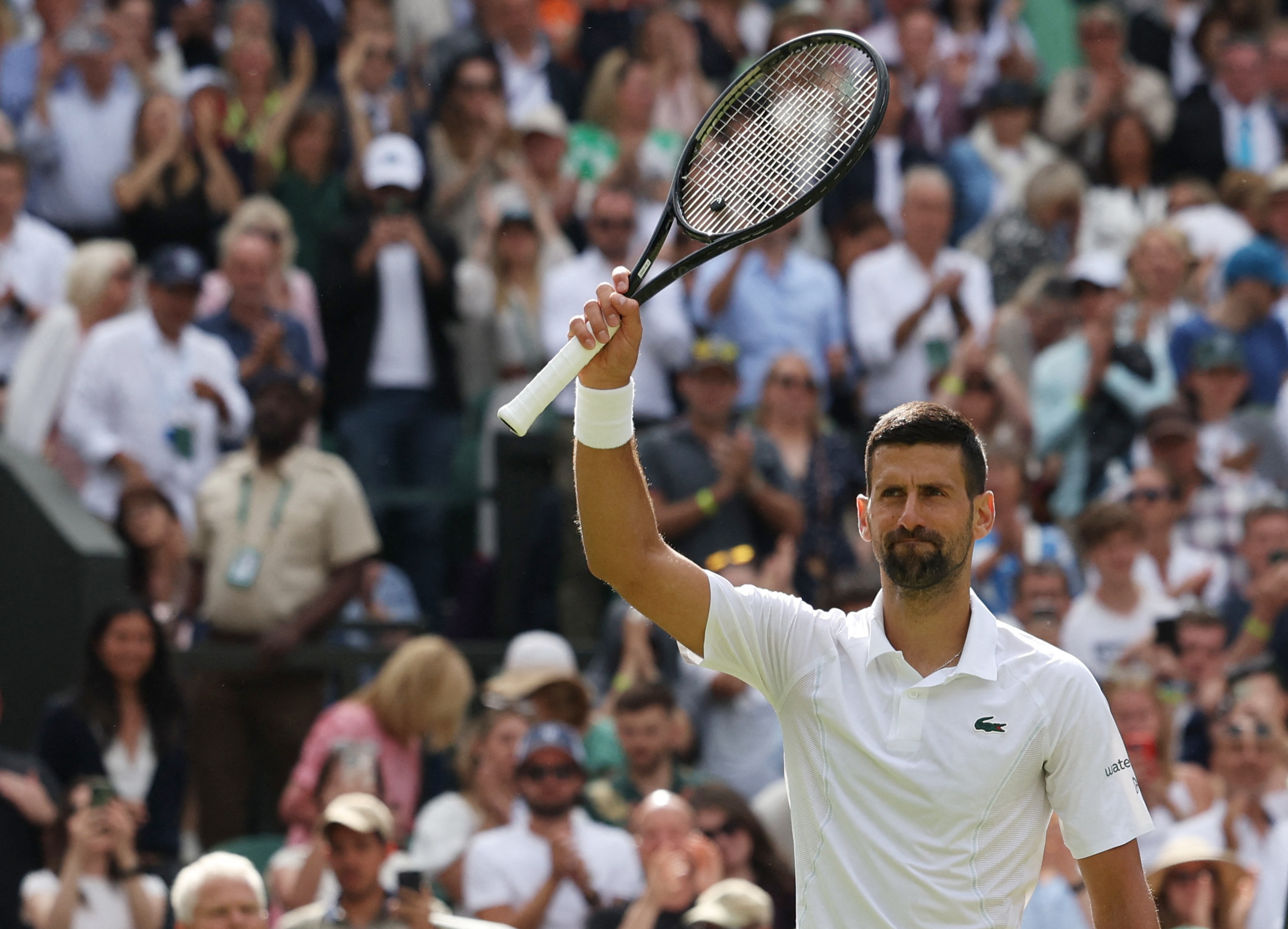 Djokovic survives spirited challenge from British wildcard Fearnley