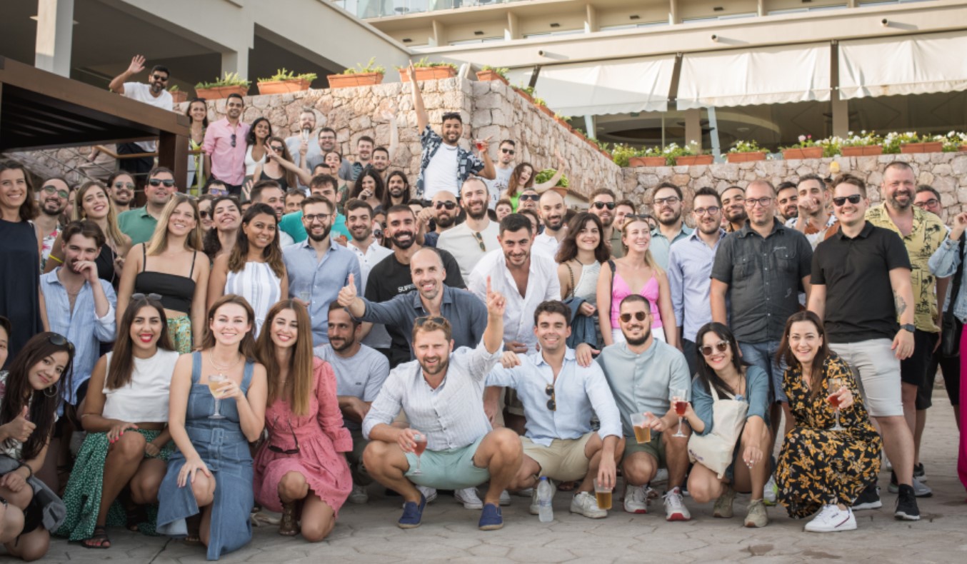 The Plum team in a group photo, with CEO Victor Trokoudes front and centre.