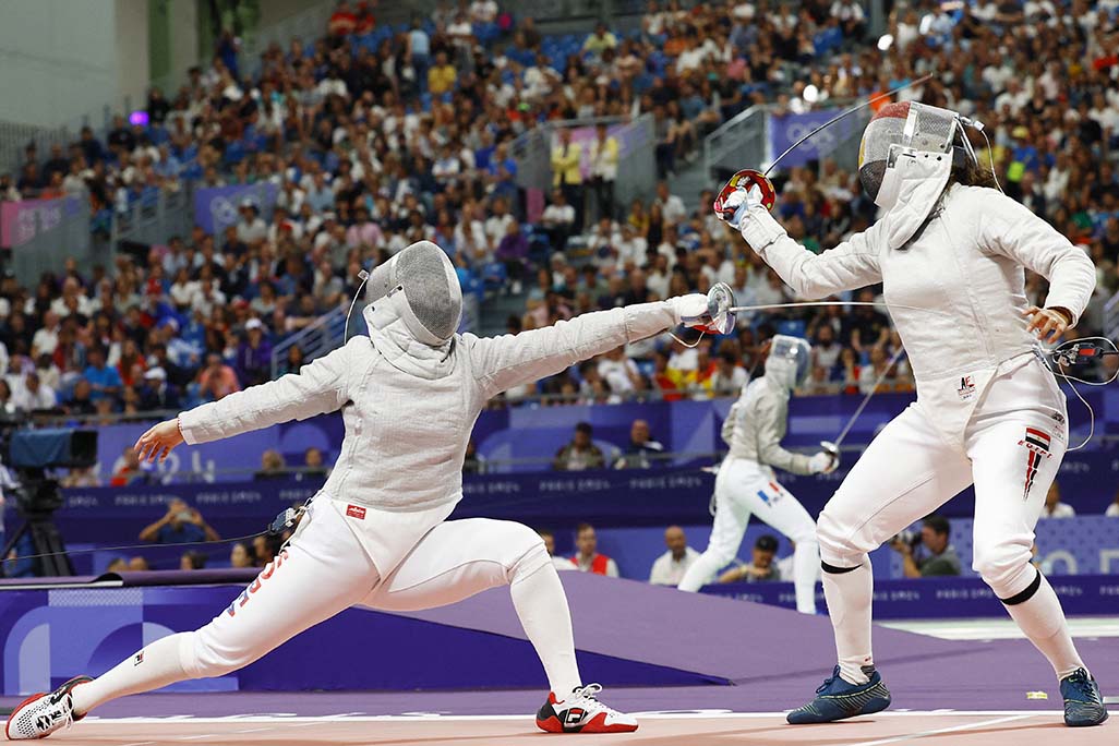 Pregnant fencer and archer send message of strength to women