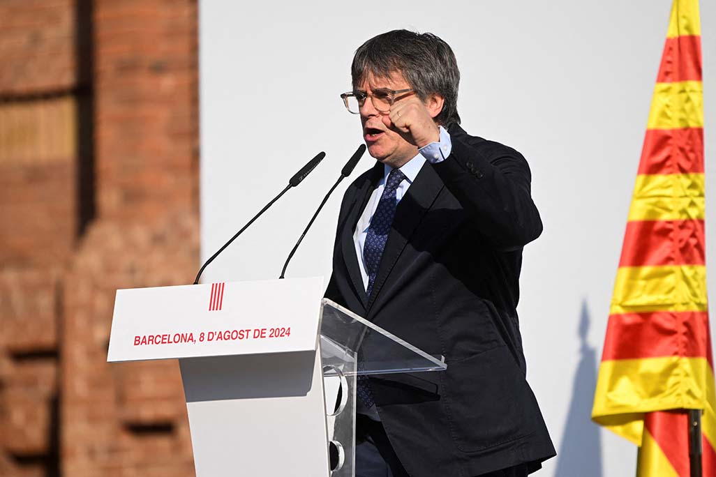 Catalan separatist Puigdemont evades capture on chaotic return to Spain