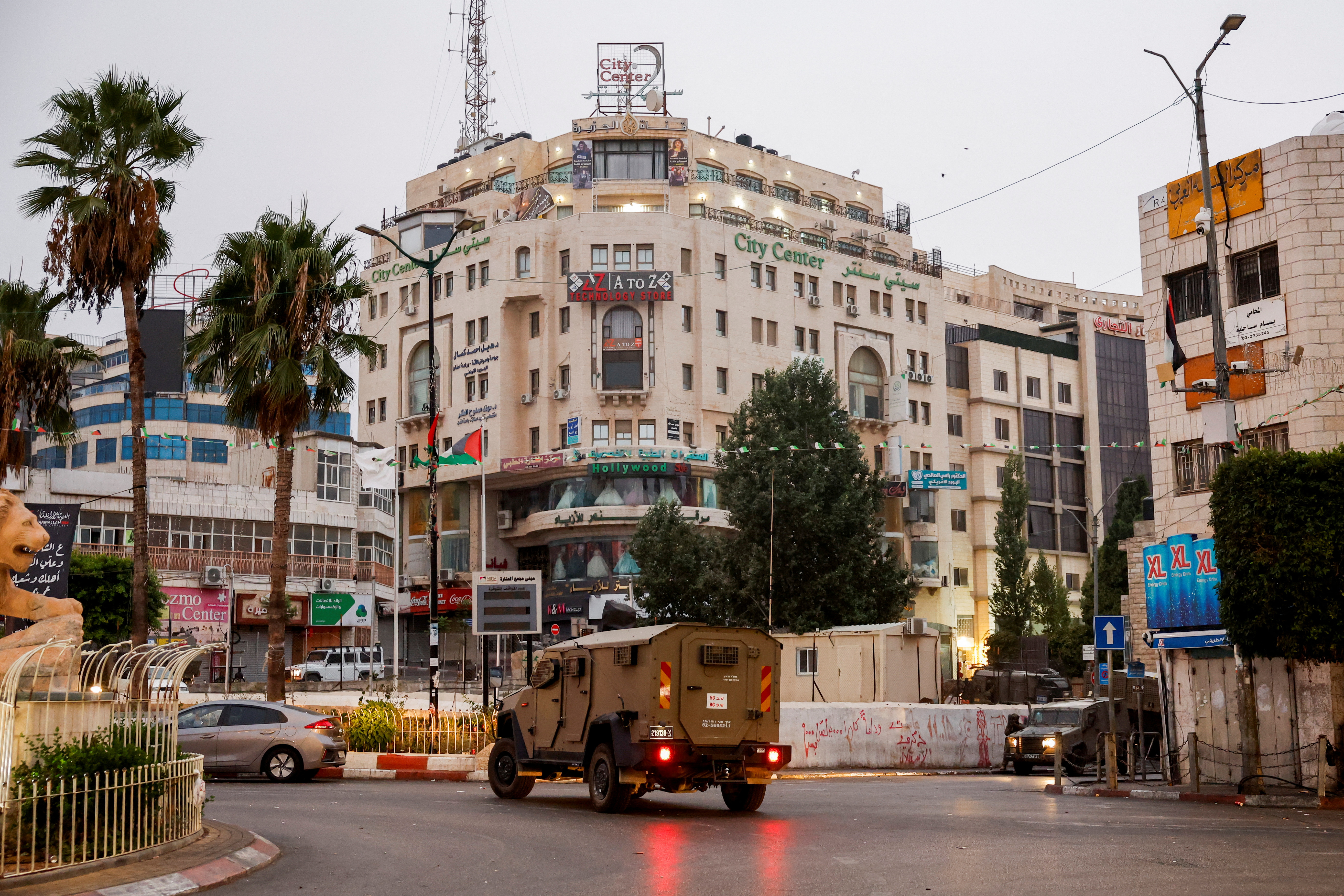 Israeli forces raid Al Jazeera bureau in West Bank with closure order