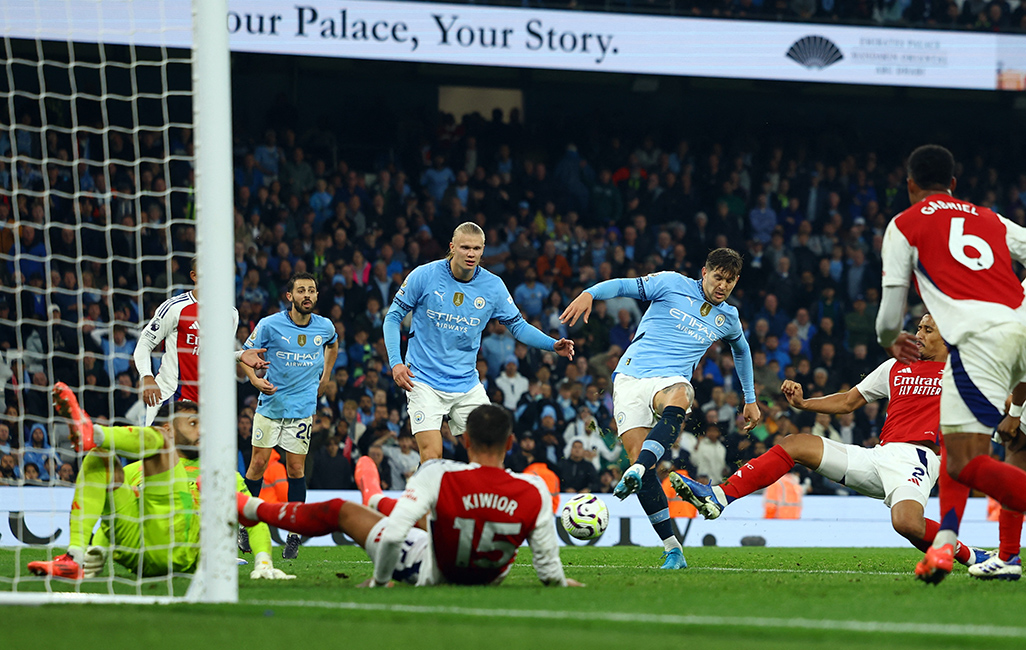 Man City rescue late draw against 10-man Arsenal