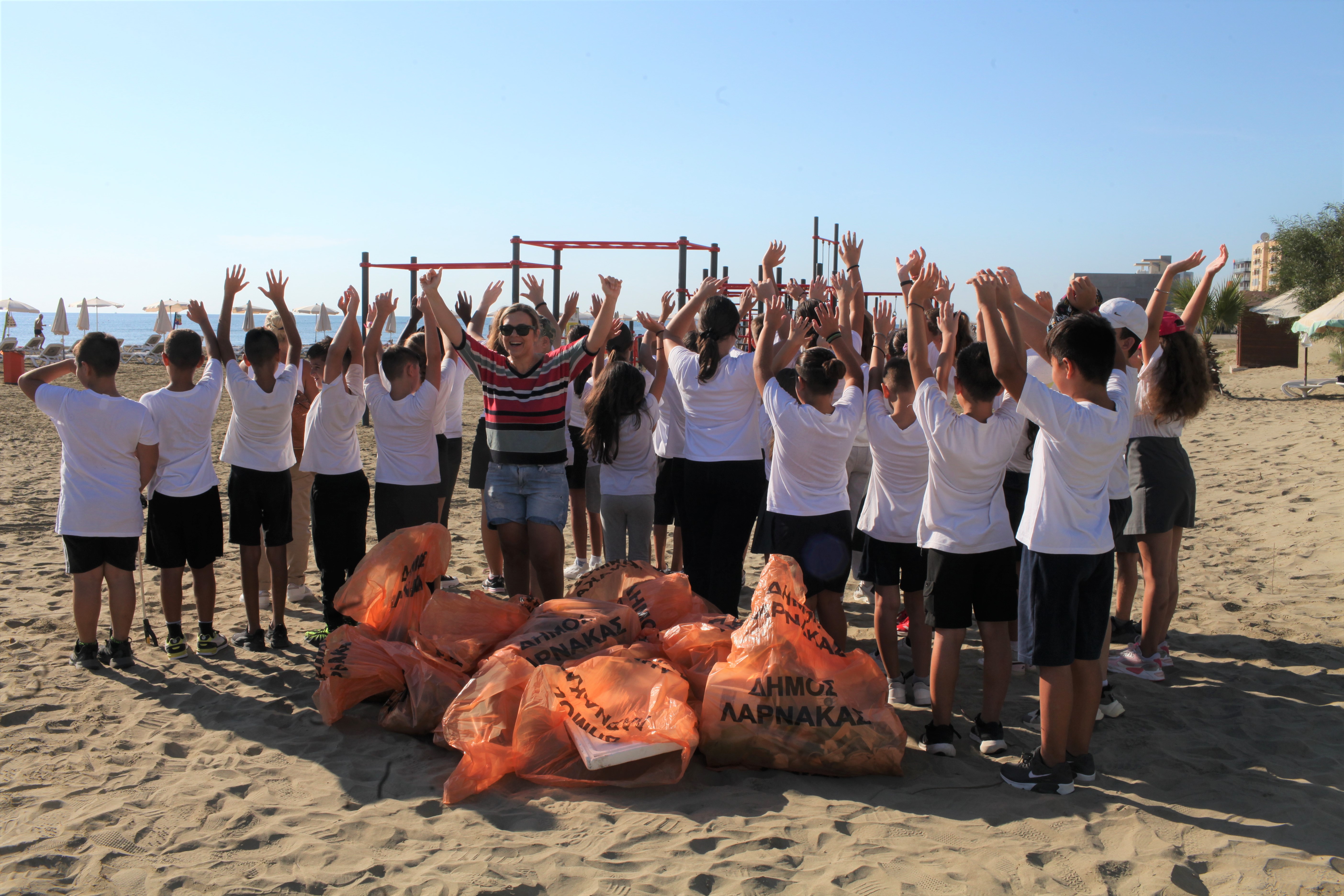 Volunteers clean Kastela Beach | Cyprus Mail