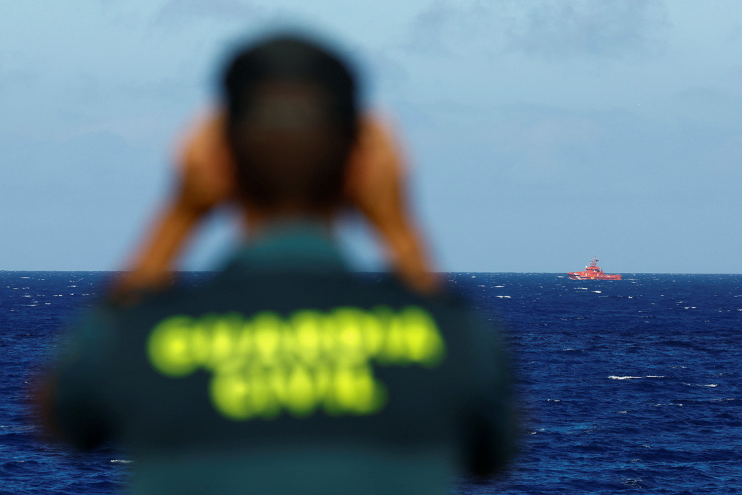 Rescuers search for dozens of migrants missing after boat sinks off Canary Islands, 9 dead found