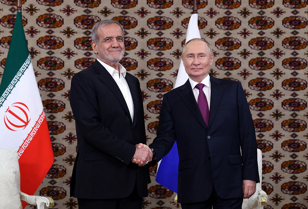 Putin cements ties with Iranian president in Central Asia meeting