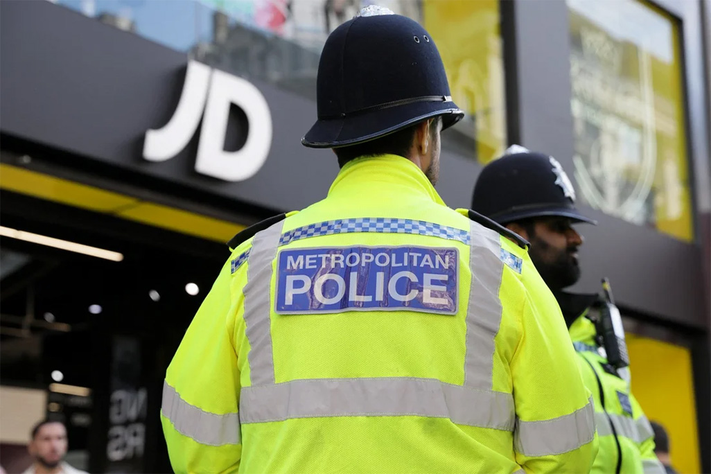 UK police officers overturn misconduct charge over search of two black athletes