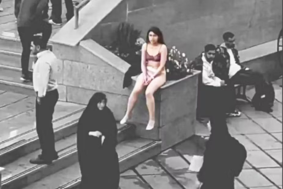 image Undressing protest shows women still fighting