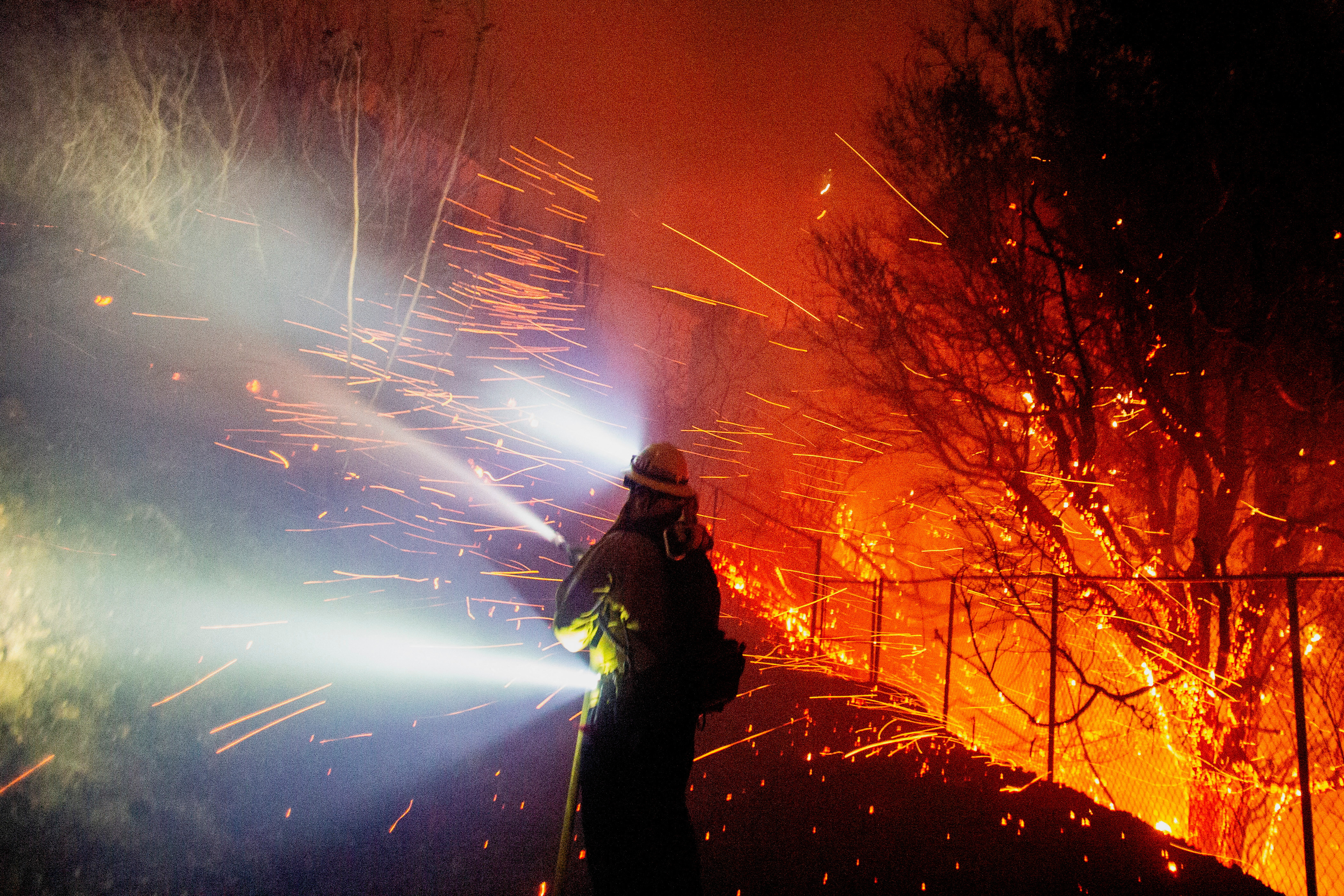 Malibu wildfire rages on, destroys several structures