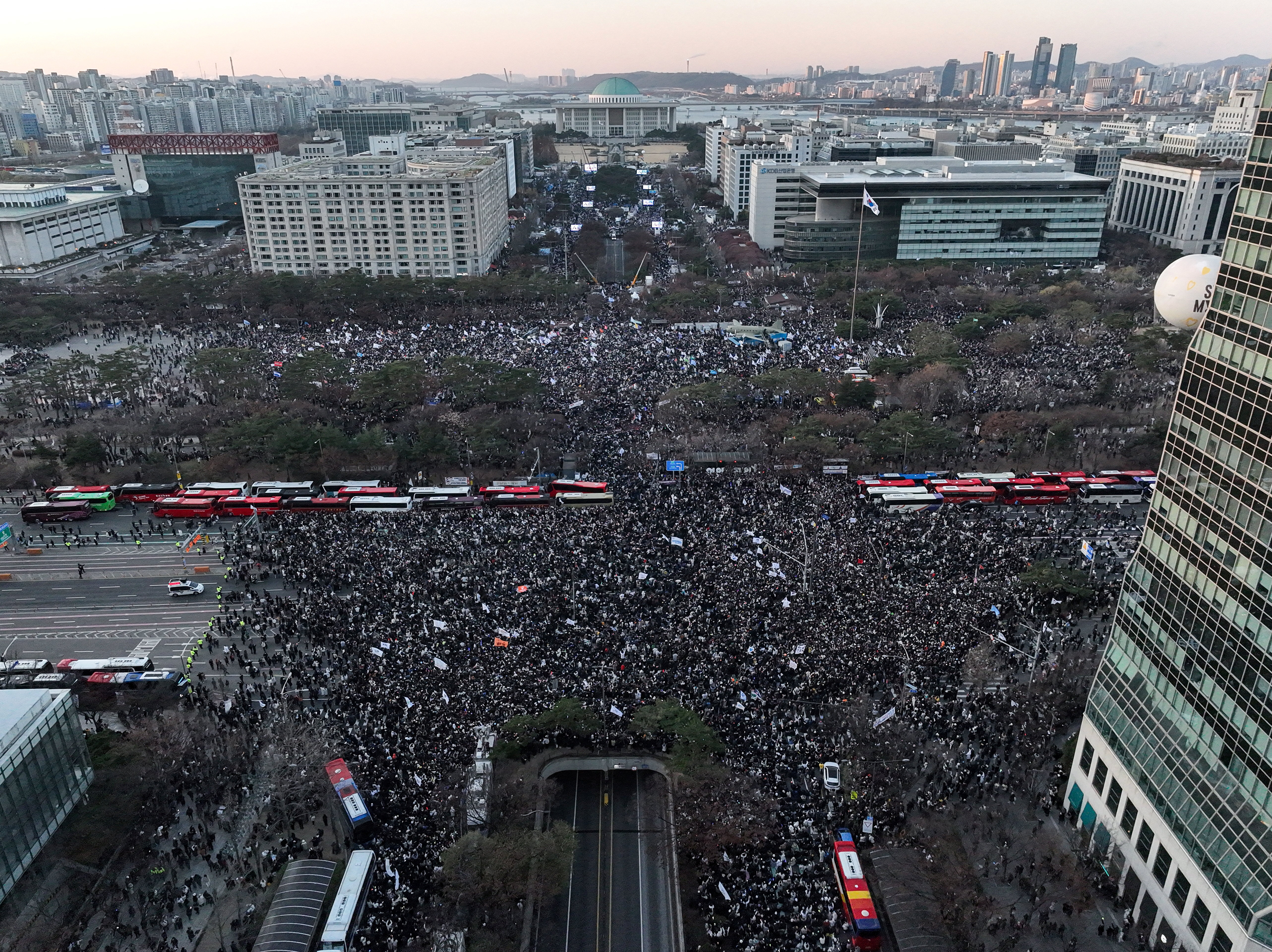 South Korea’s acting president moves to reassure allies, calm markets after Yoon impeachment