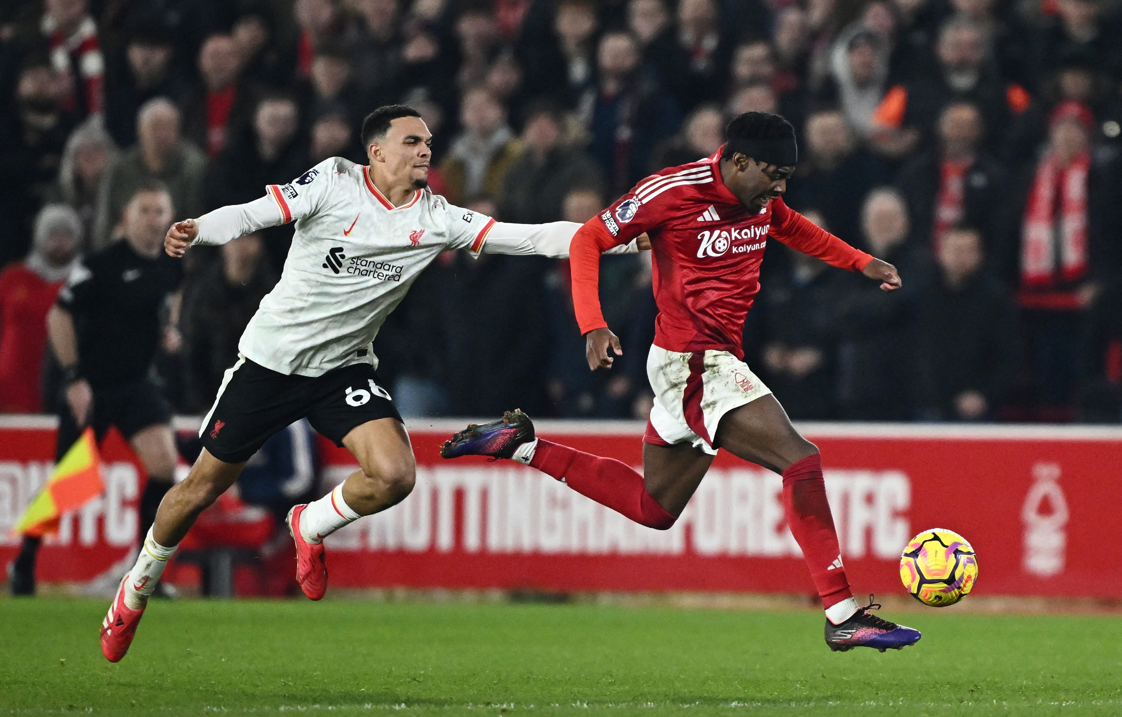 Jota earns leaders Liverpool 1-1 draw at high-flying Forest, City held at Brentford after late collapse