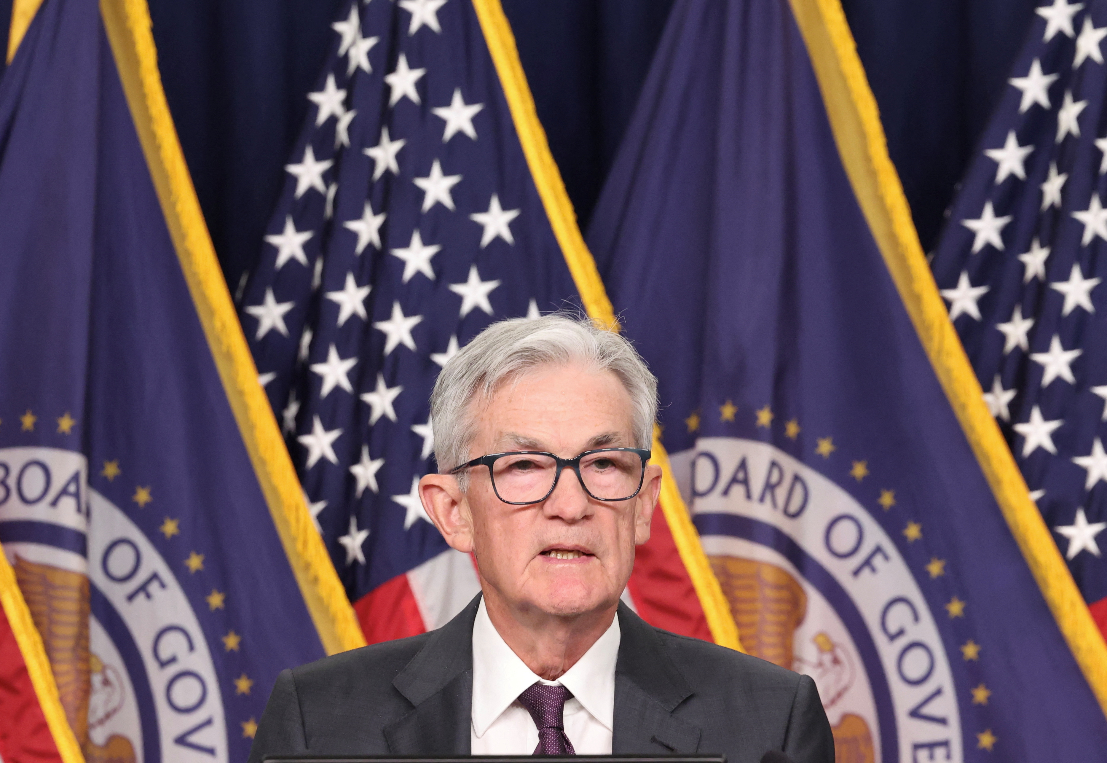 Fed leaves rates unchanged, drops reference to inflation ‘progress’ from policy statement