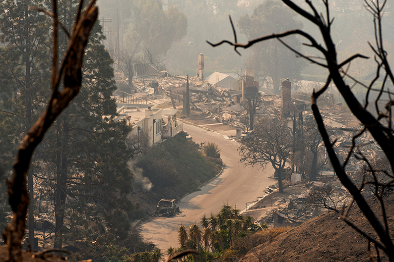 Los Angeles firefighters make progress as intense winds ease