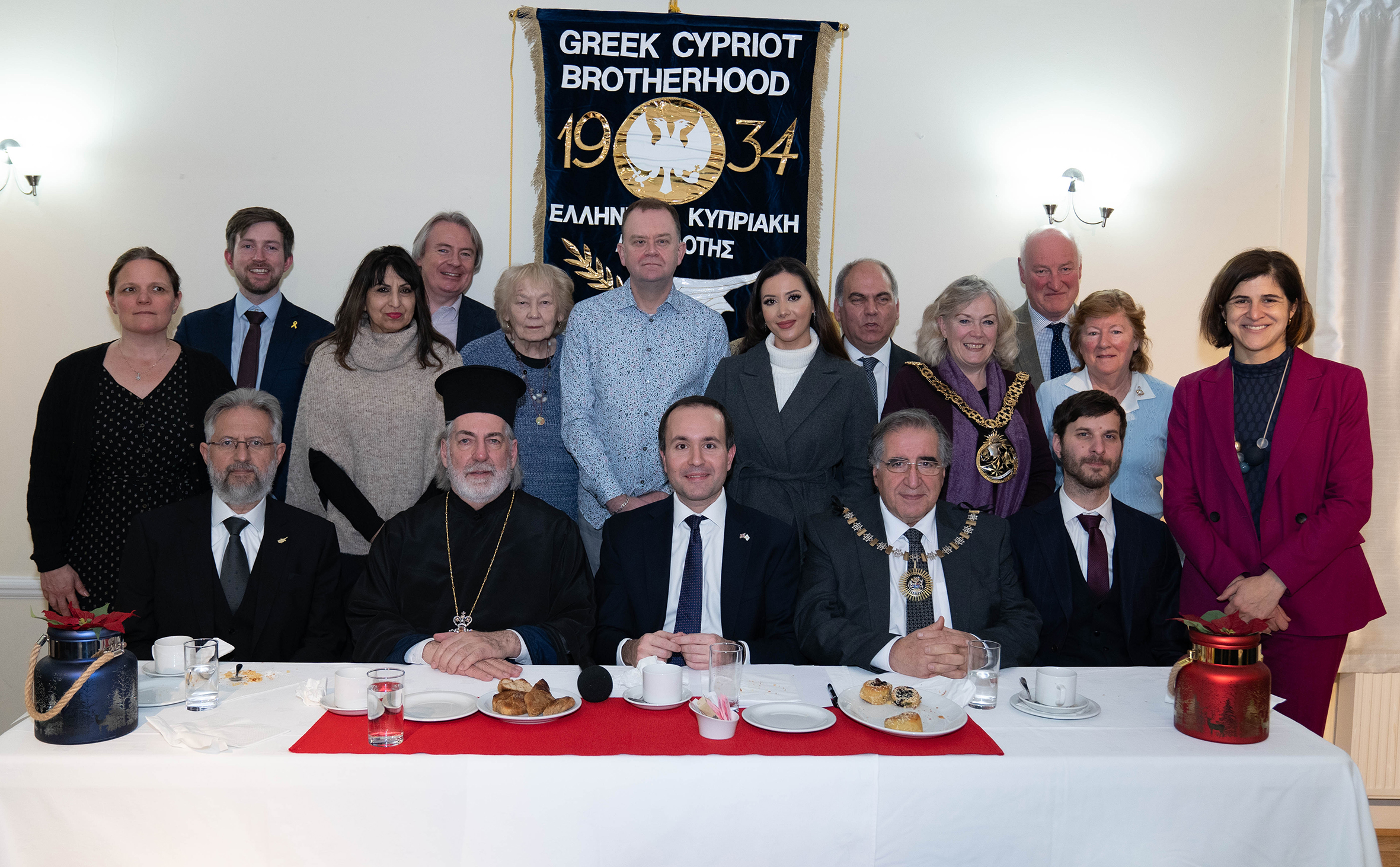 image Cypriot diaspora in UK mark 2025 with cutting of vasilopita