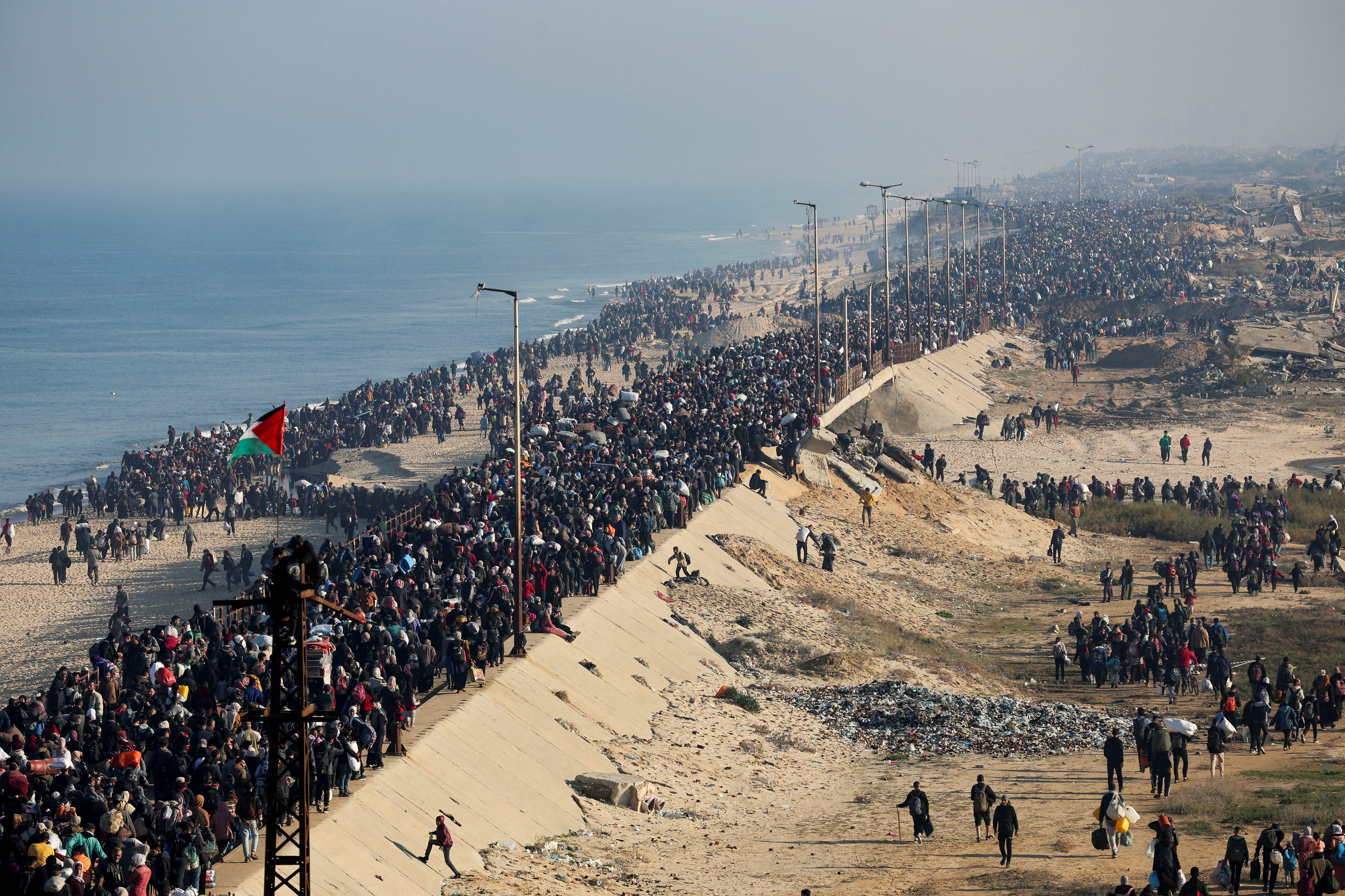 Gaza residents start to return north as crossing opened after hostage breakthrough