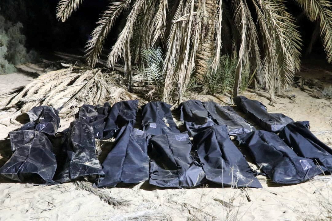 Migrants’ bodies in Libya mass graves had gunshot wounds, IOM says