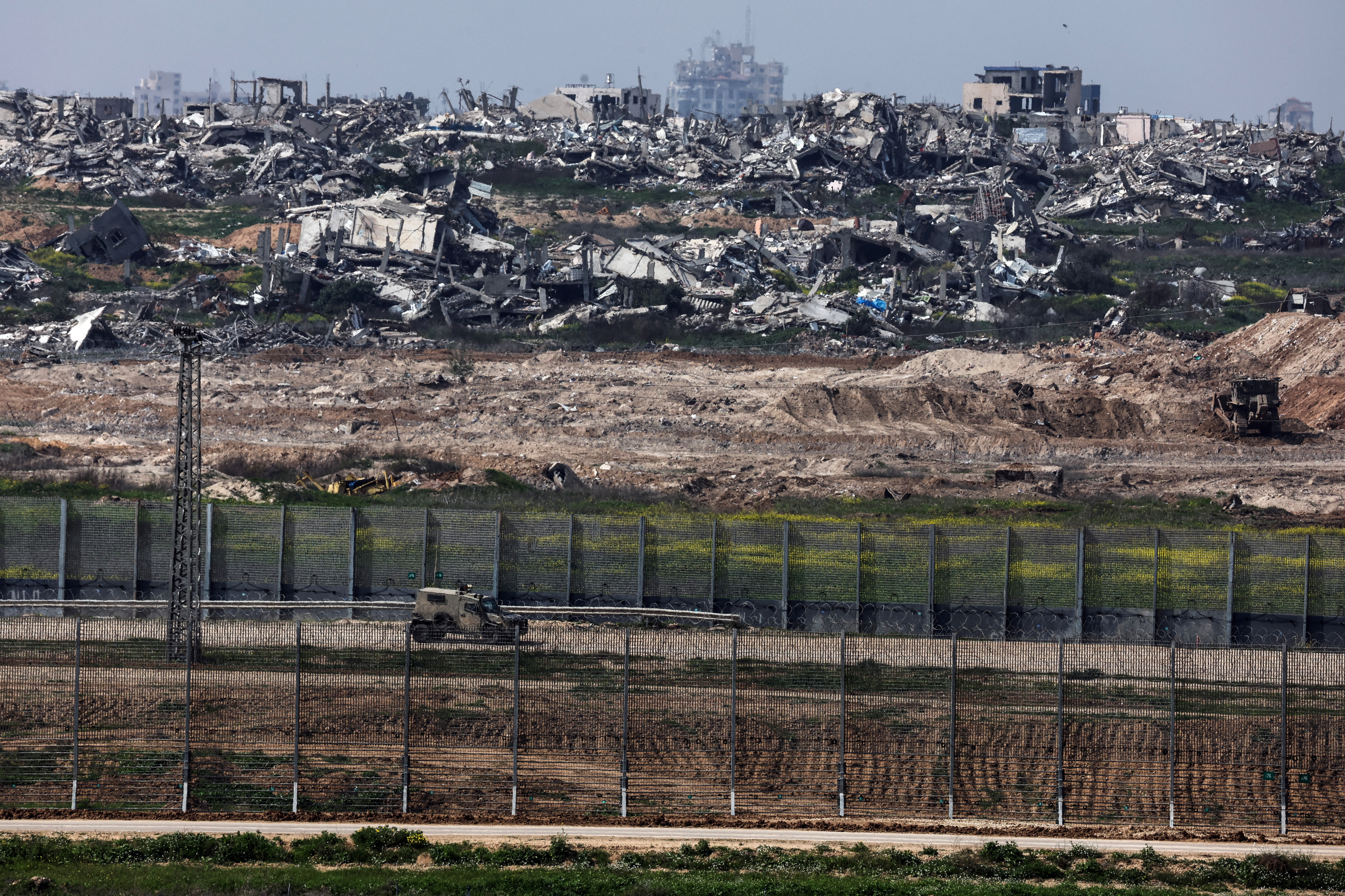 Israeli air strike kills nine in Gaza, local ministry says, during ceasefire disputes