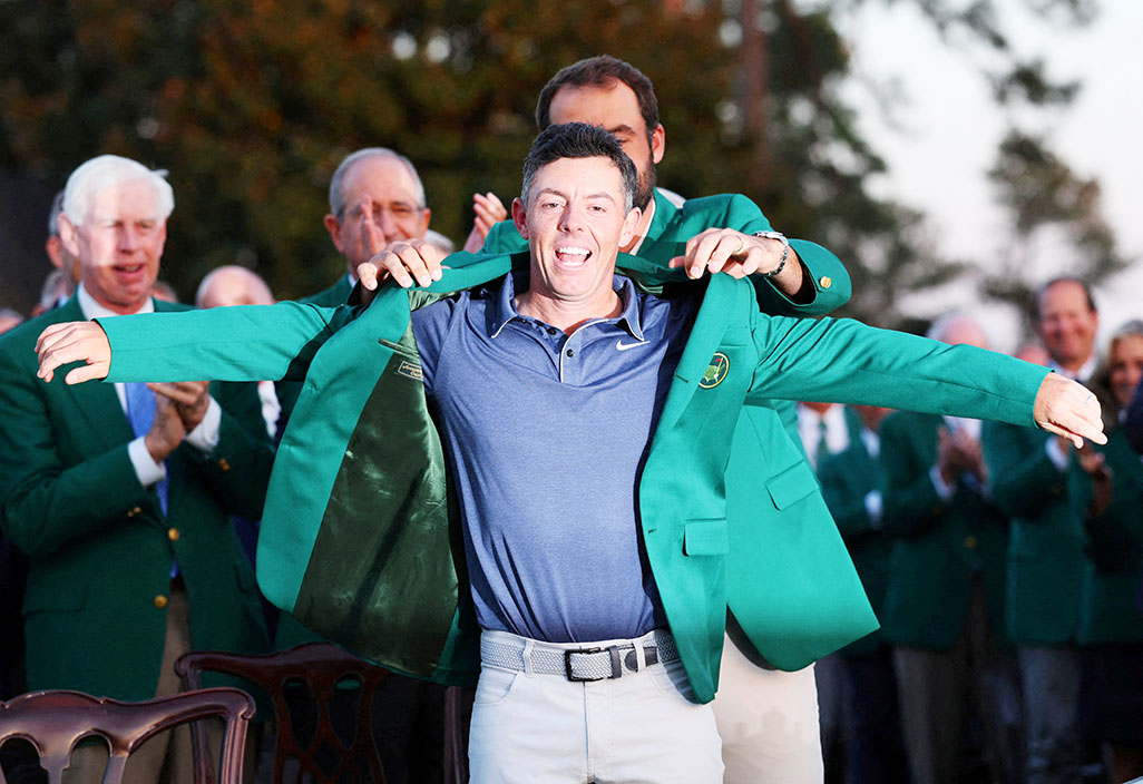 Emotional McIlroy completes career Grand Slam at Masters