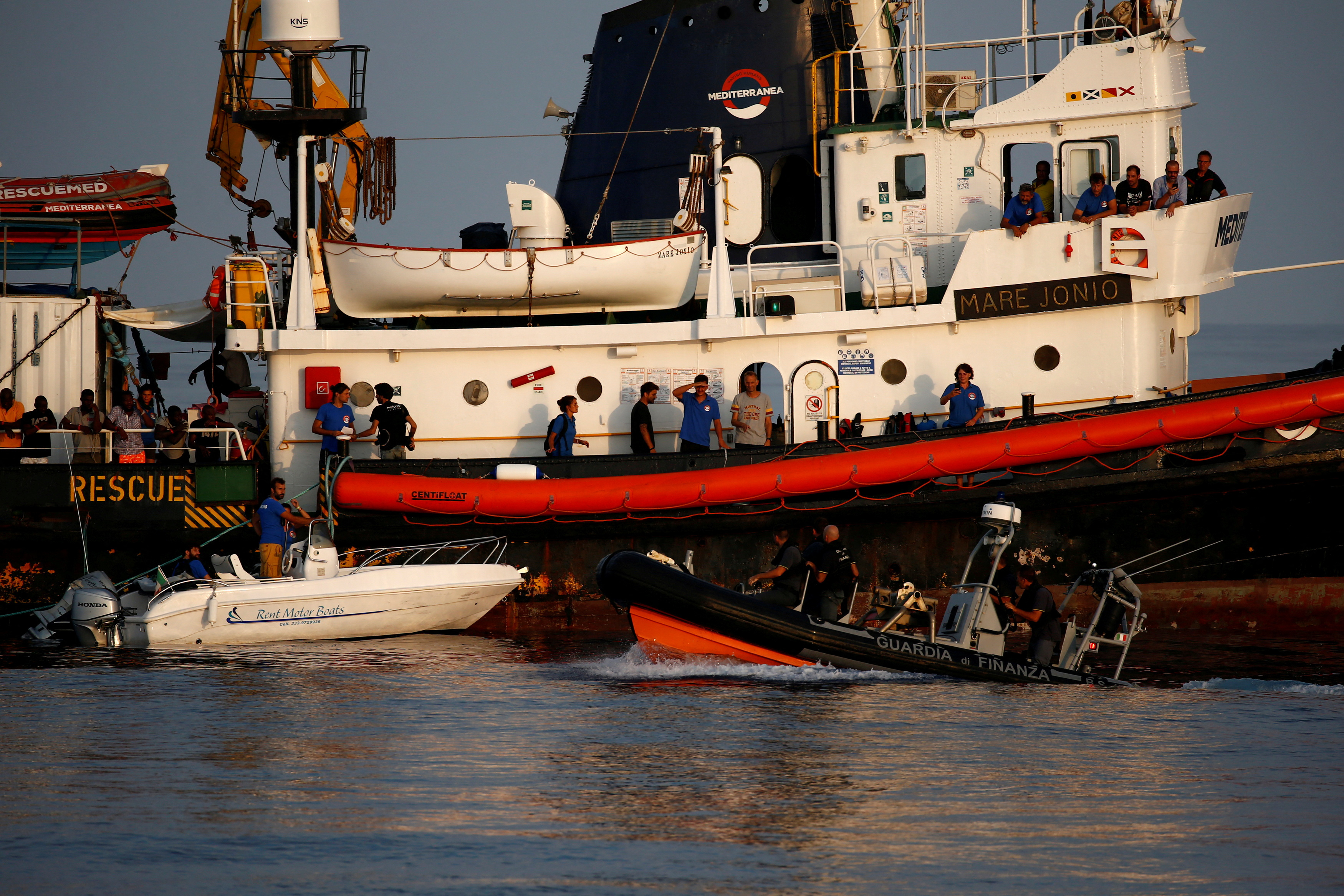 cover Italian activists face trial for migrant sea rescue in legal first
