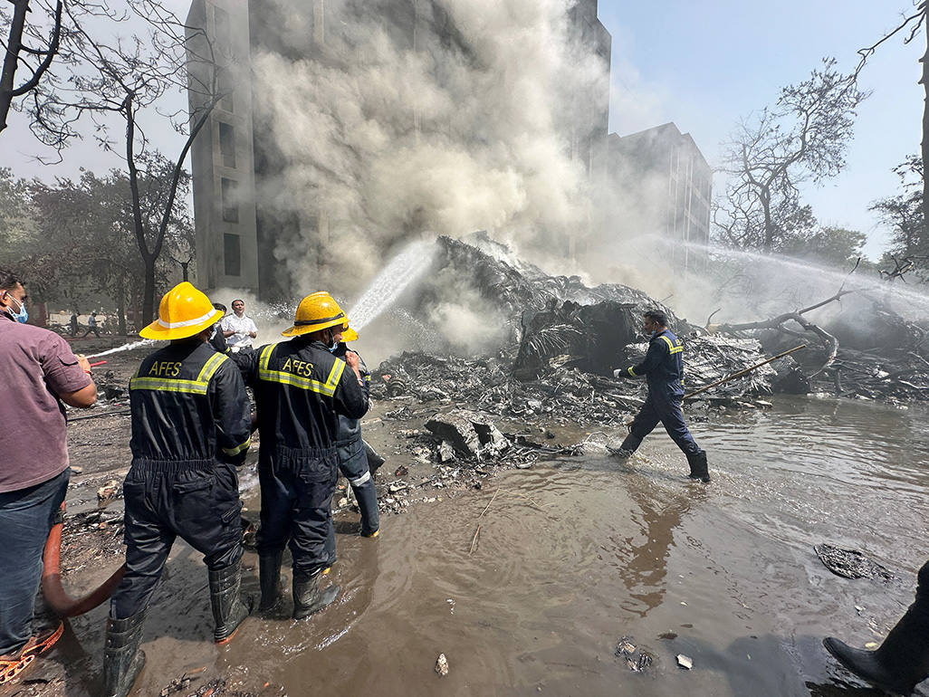 At least 30 killed as Air India plane with 242 on board crashes near Ahmedabad