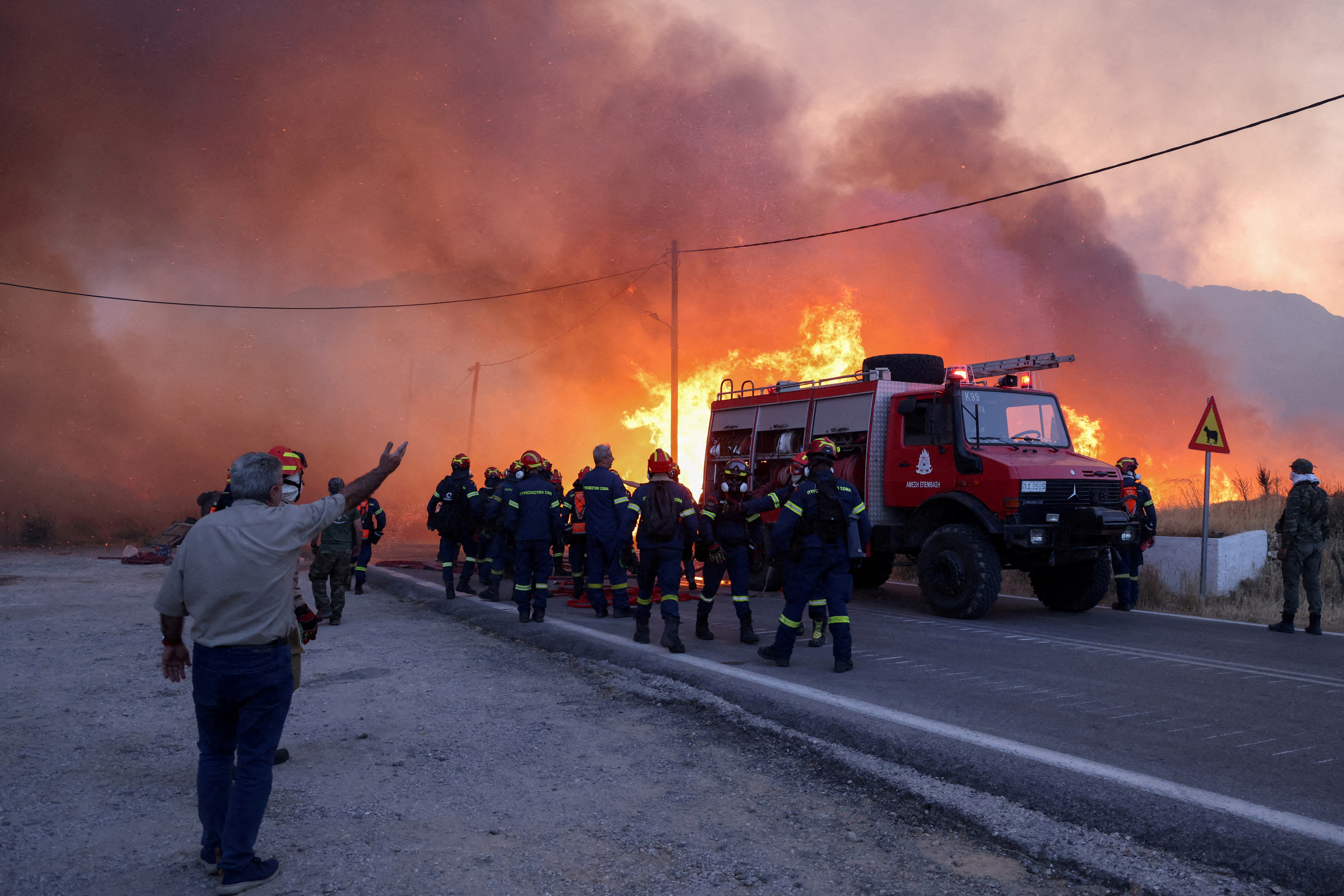 Hundreds of firefighters battle wildfires on Greece’s Chios island for third day
