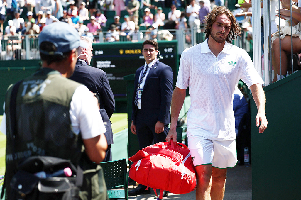 cover Tsitsipas at a loss to explain injury woes after early exit