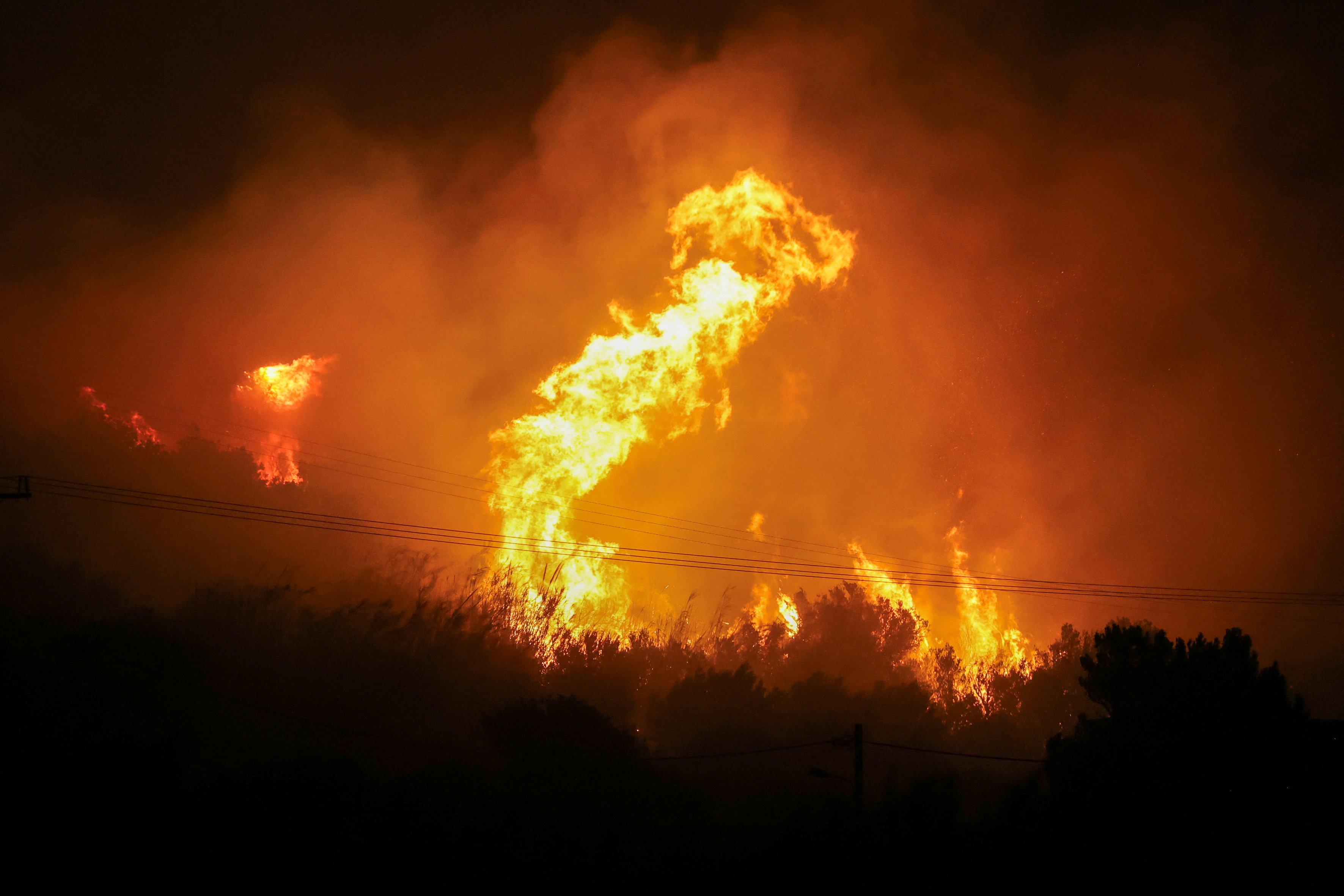 image Greek firefighters battle wildfire on island of Crete