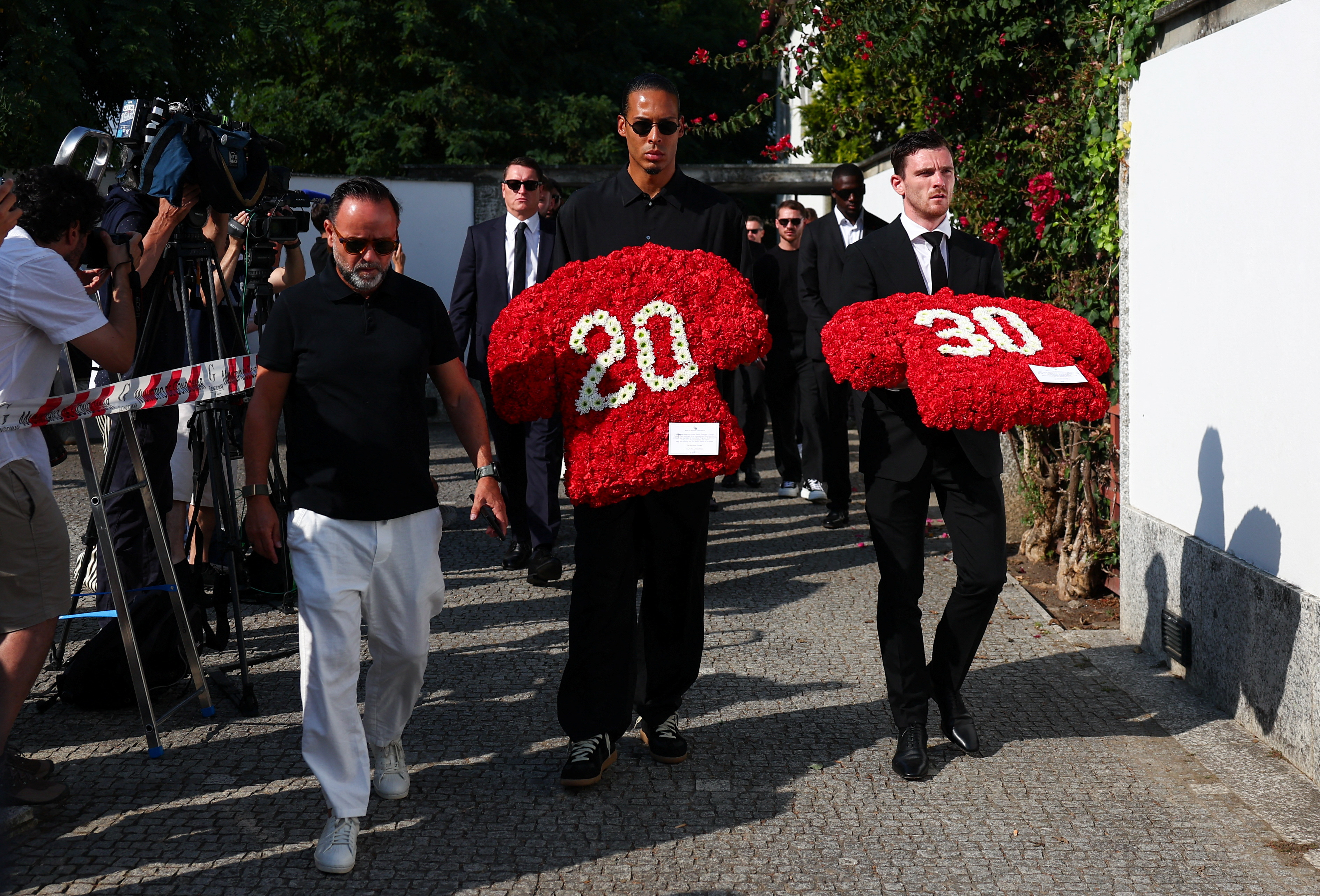 cover Carrying red wreath, Liverpool players join family for Diogo Jota&#8217;s funeral