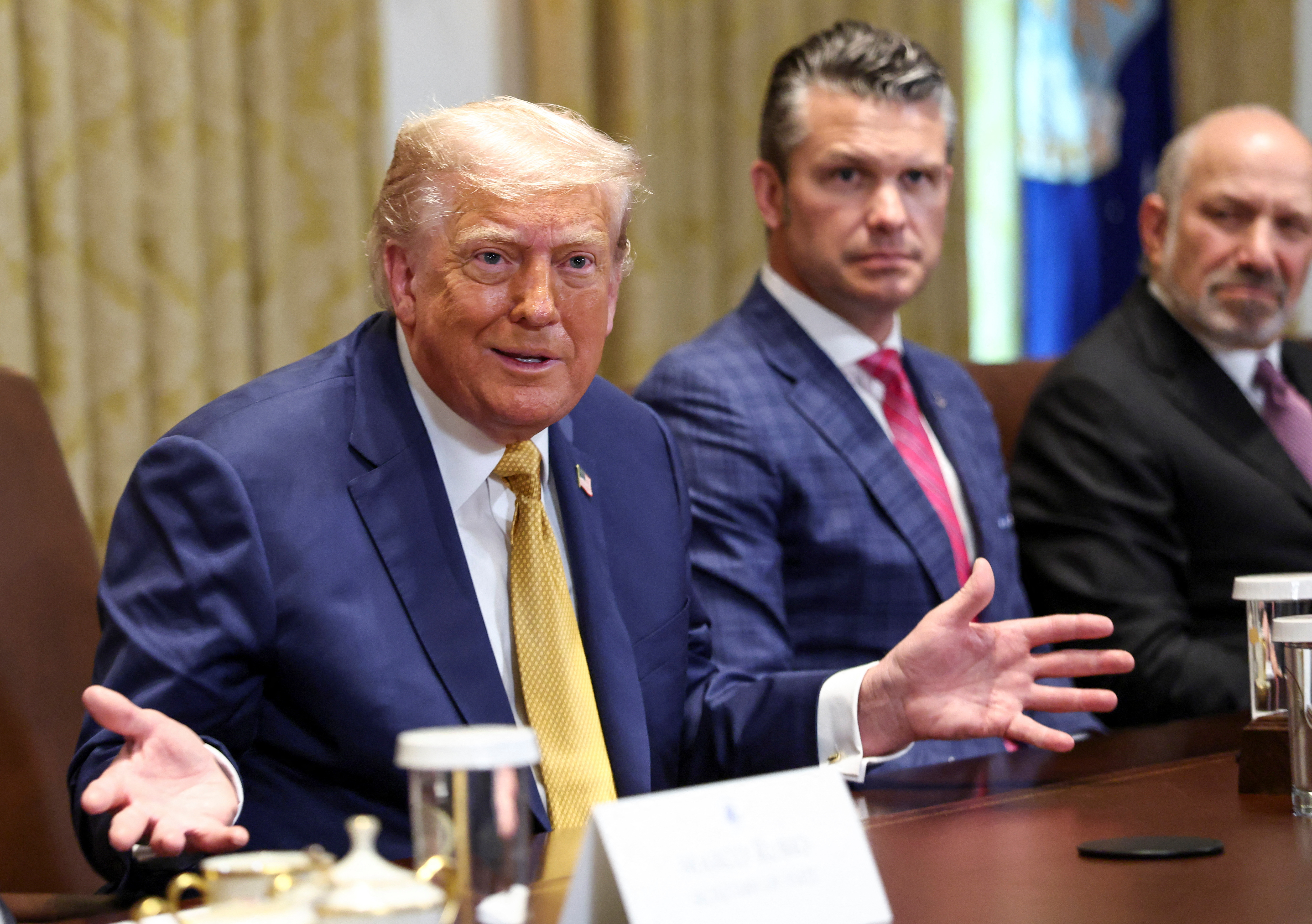 image Trump escalates trade war with 50% tariff on copper, eyes levies on drugs and chips