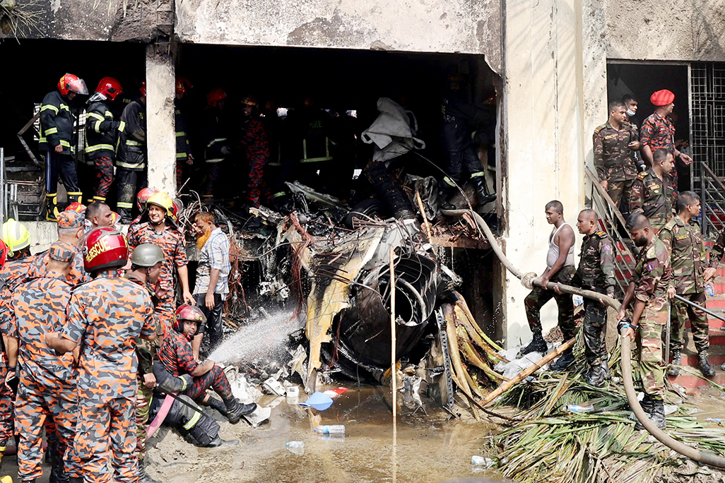 cover At least 19 killed as Bangladesh air force plane crashes into college campus